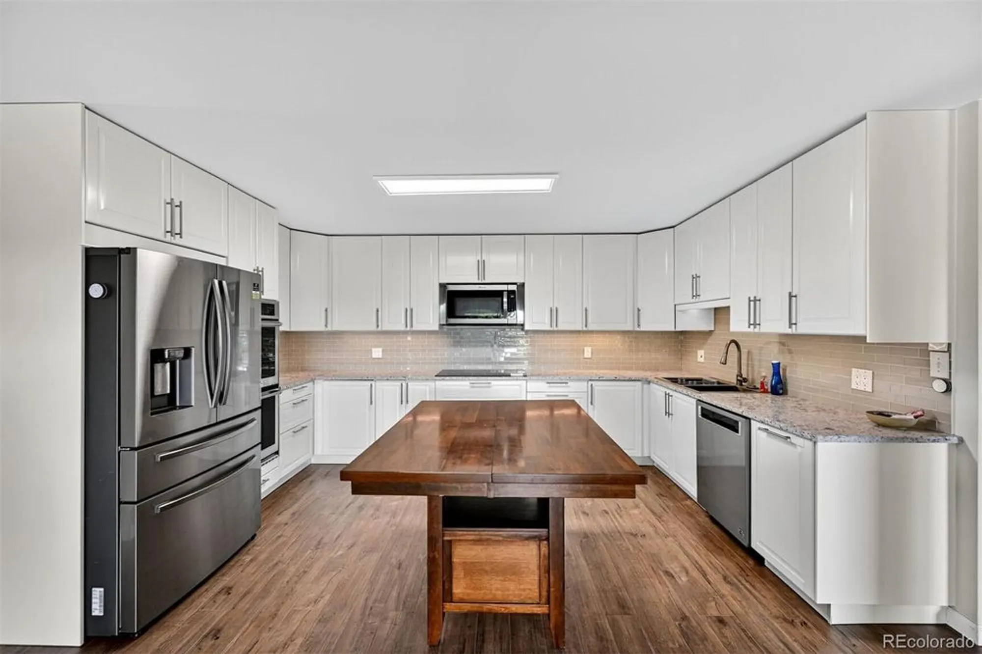 Property Slideshow image 4 of 46 | 9180 e center ave 4d, Denver, CO, 80247