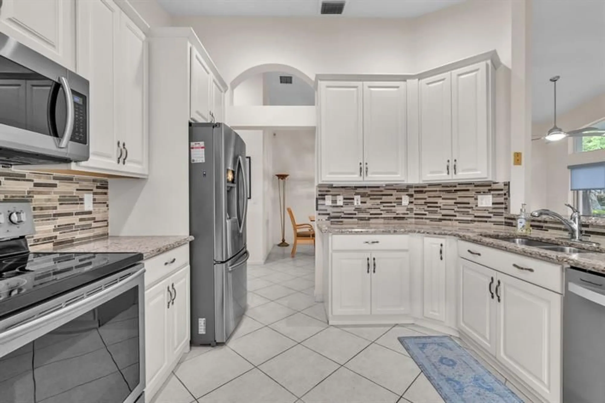 Property Slideshow image 4 of 57 | 5701 swaying palm ln, Boynton Beach, FL, 33437