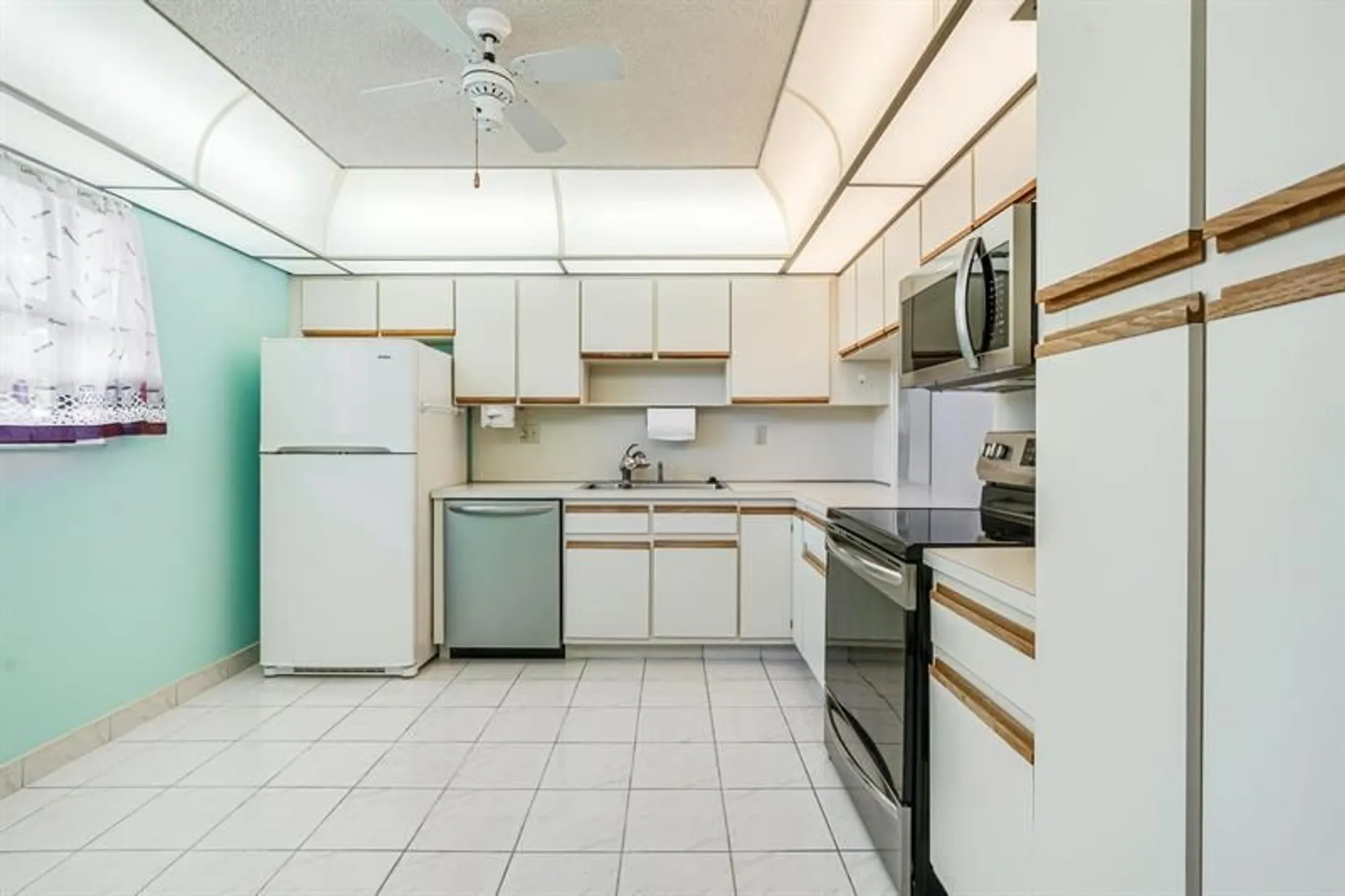 Property Slideshow image 6 of 32 | 4955 e sabal palm blvd 104, Tamarac, FL, 33319