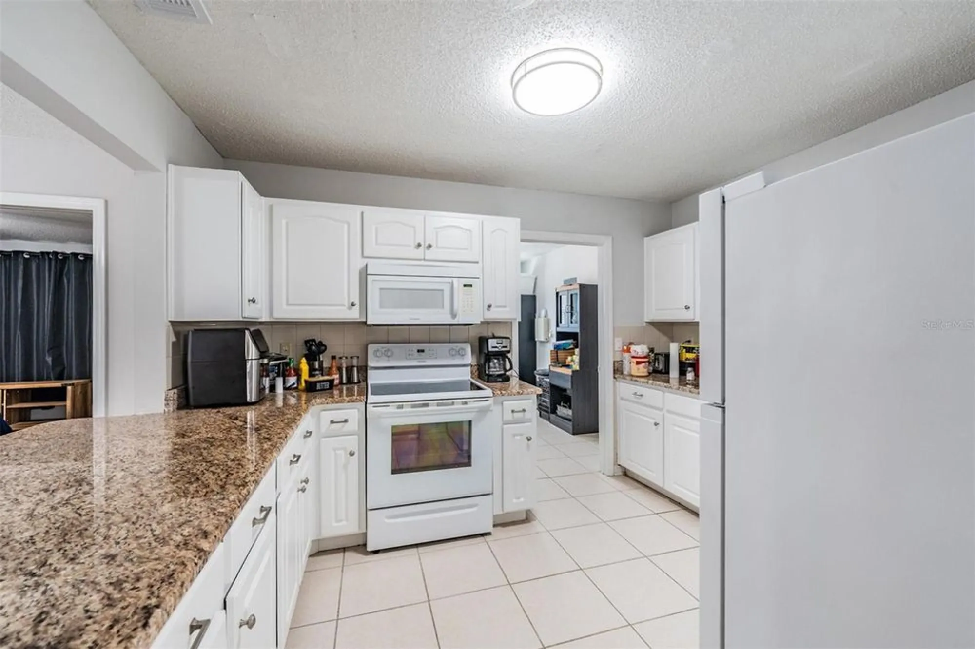 Property Slideshow image 11 of 51 | 1209 wild feather ln, Sun City Center, FL, 33573
