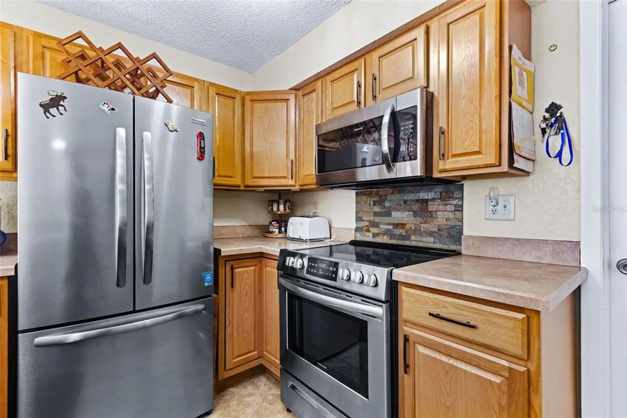 Property Slideshow image 11 of 37 | 1417 heather ridge blvd, Dunedin, FL, 34698