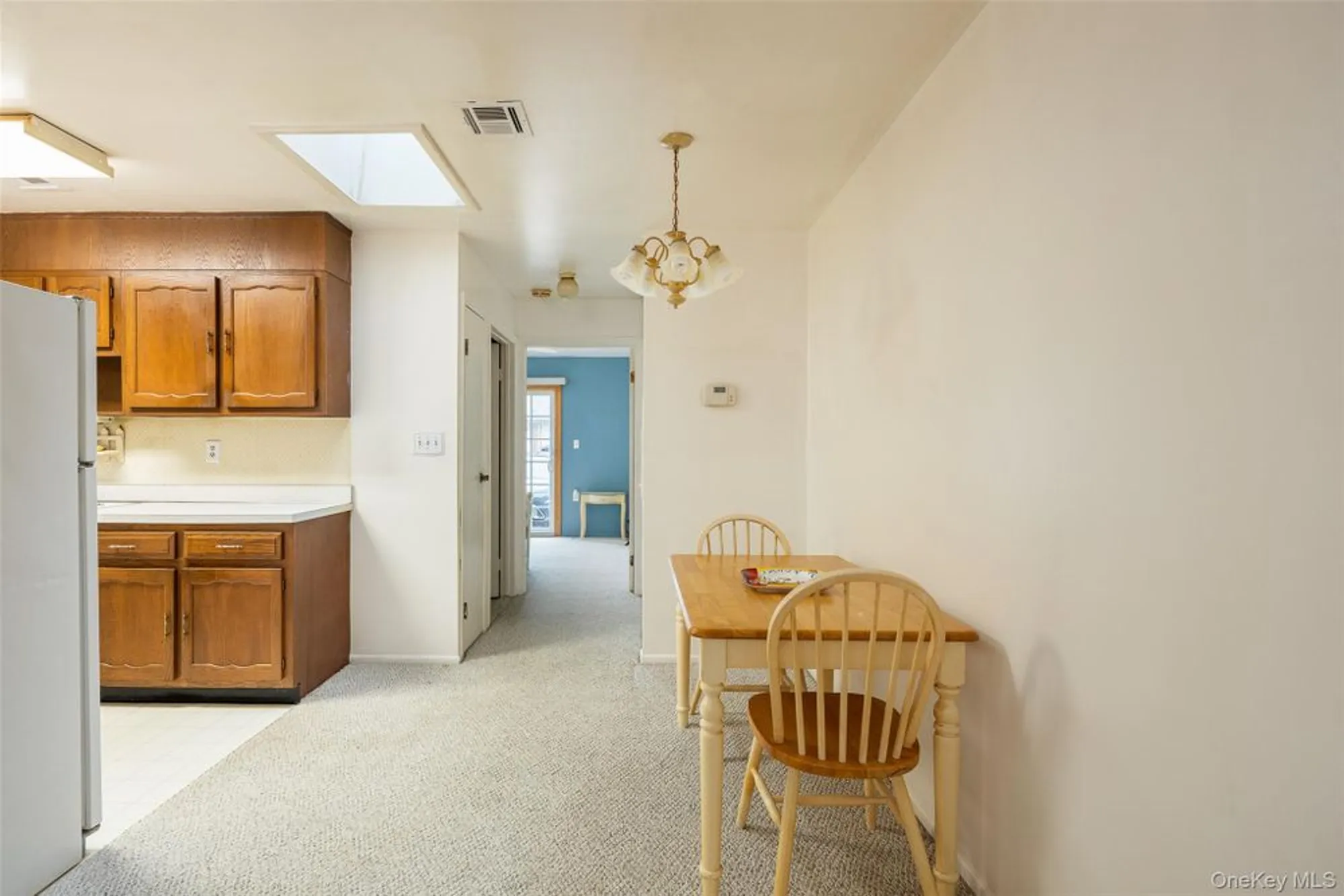Property Slideshow image 5 of 24 | 261 newcastle ct unit d, Ridge, NY, 11961