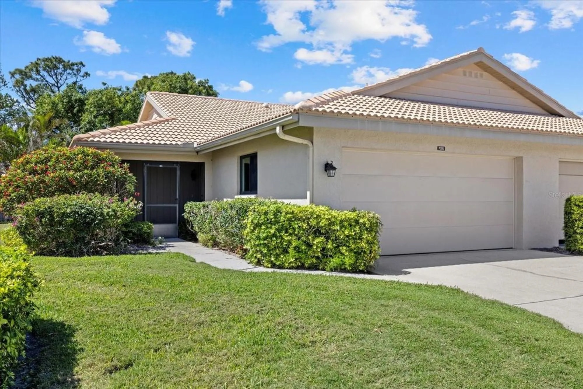 Property Slideshow image 2 of 33 | 7205 wood creek dr 16, Sarasota, FL, 34231