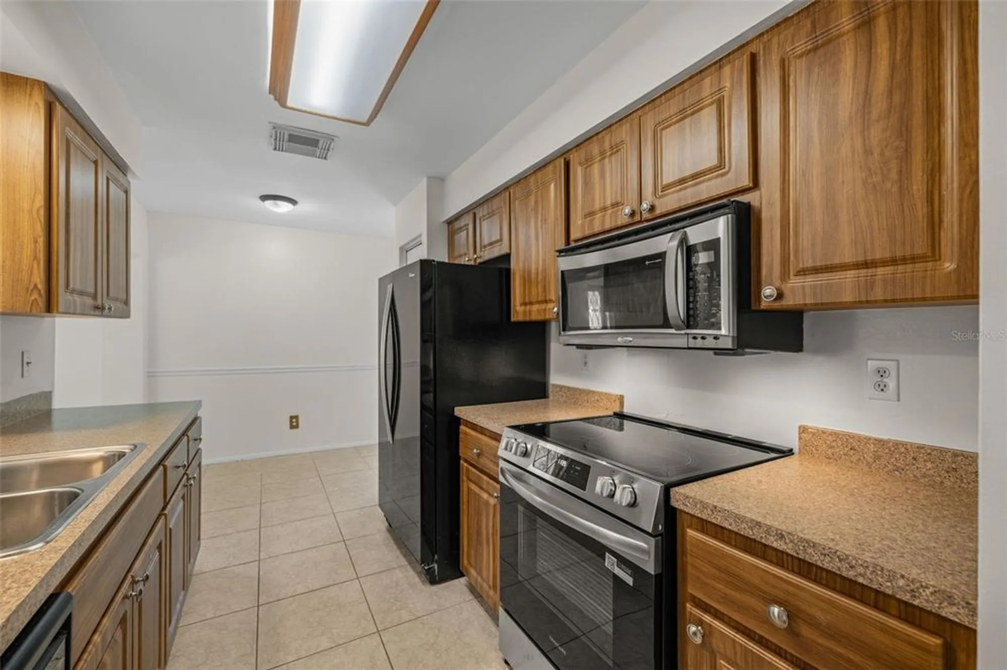 Property Slideshow image 11 of 50 | 142 stafford cir, Palm Harbor, FL, 34684
