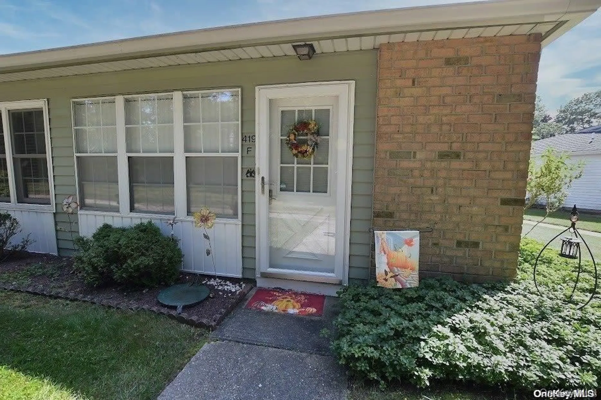 Property Slideshow image 2 of 30 | 419 weymouth ct unit f f, Ridge, NY, 11961
