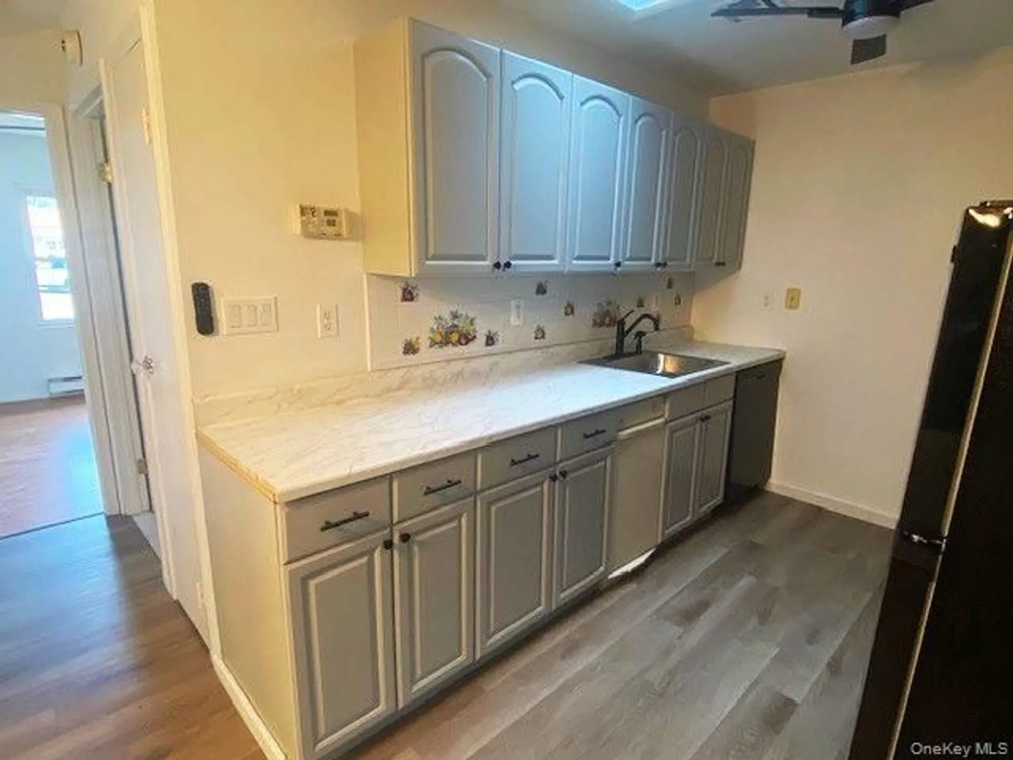 Property Slideshow image 9 of 21 | 259 newcastle ct e, Ridge, NY, 11961