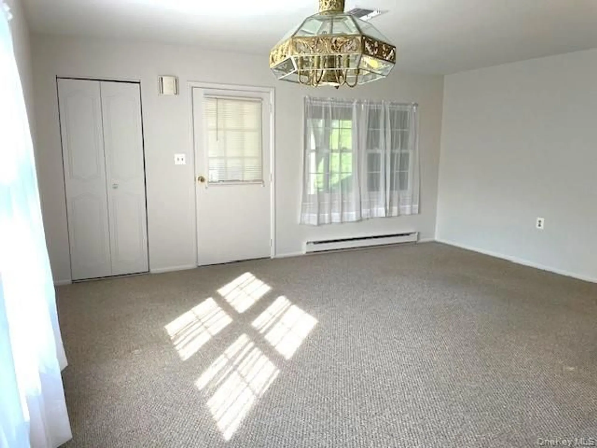 Property Slideshow image 2 of 14 | 120 exmore ct d, Ridge, NY, 11961