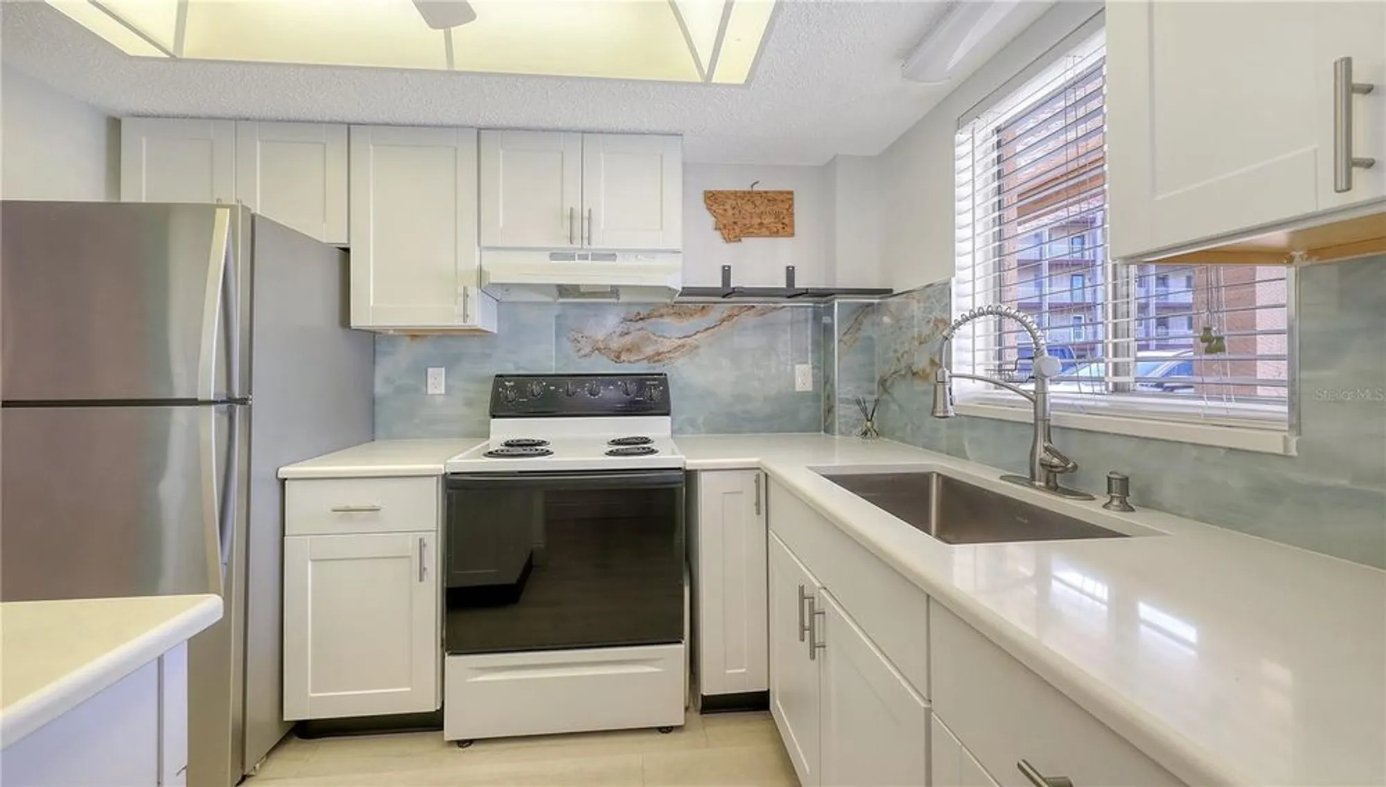 Property Slideshow image 4 of 37 | 3845 lake bayshore dr # f103, Bradenton, FL, 34205