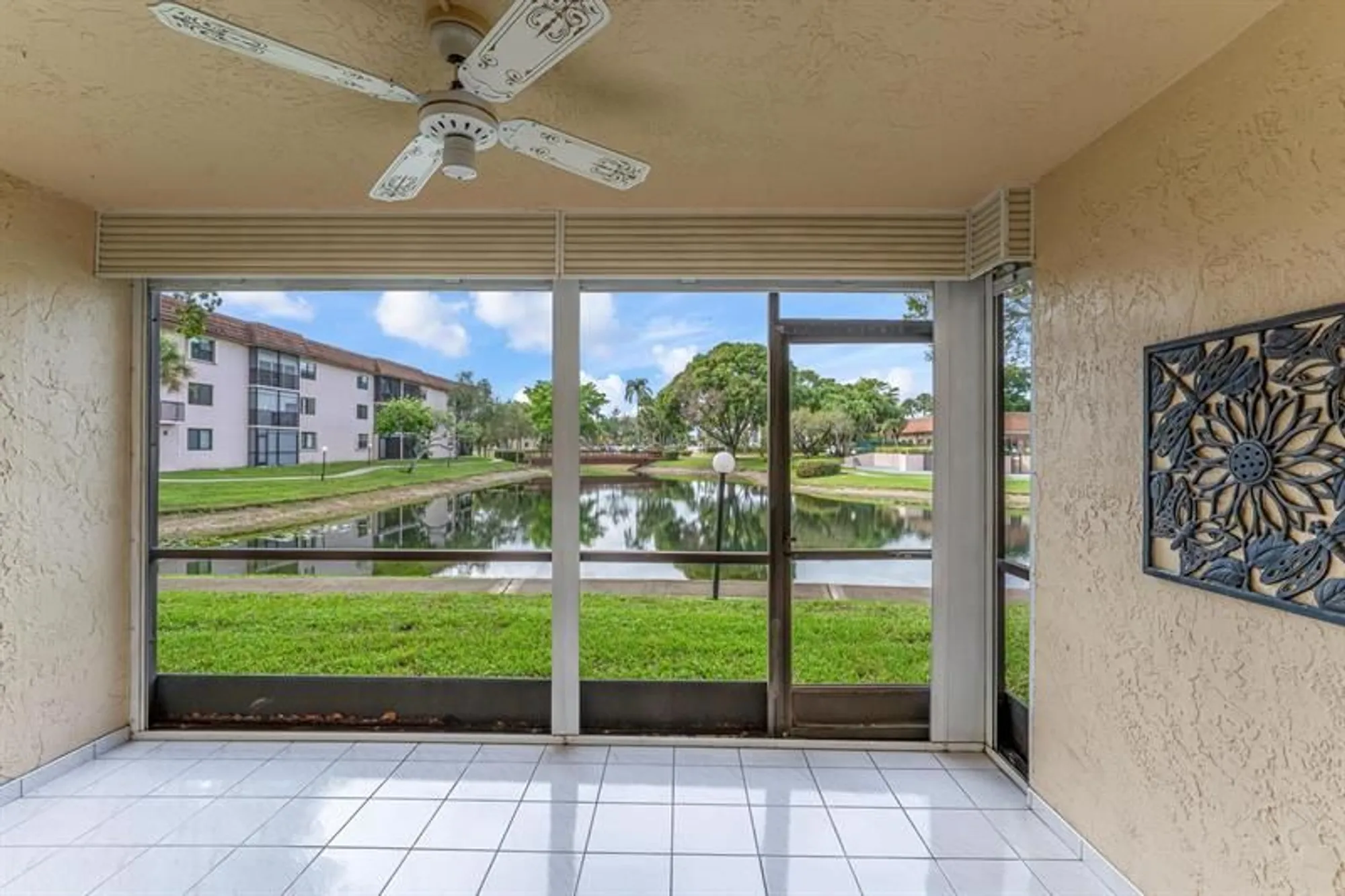 Property Slideshow image 2 of 32 | 4955 e sabal palm blvd 104, Tamarac, FL, 33319