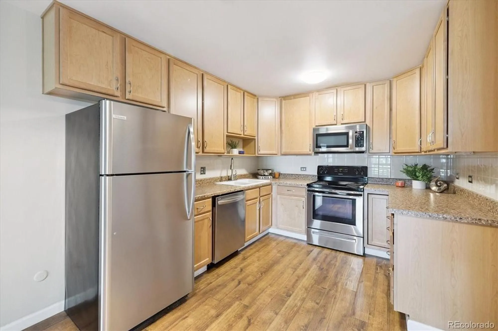 Property Slideshow image 3 of 50 | 9155 e center ave 2d, Denver, CO, 80247