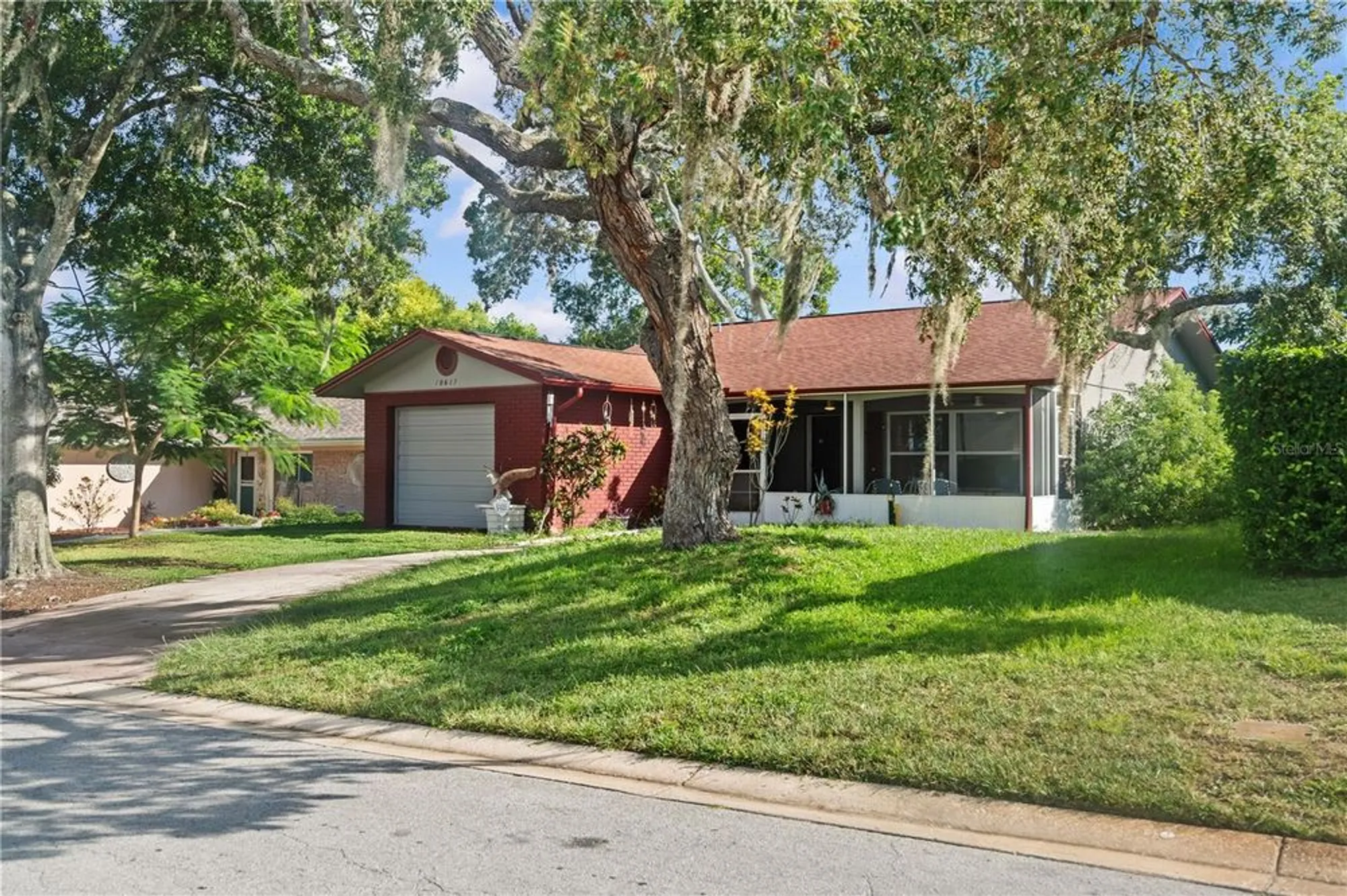 Property Slideshow image 4 of 48 | 10619 mira vista dr, Port Richey, FL, 34668