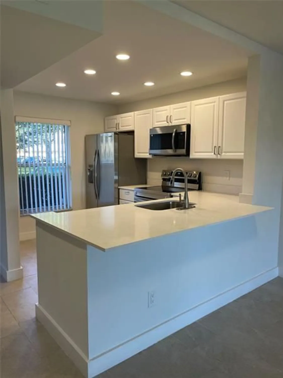 Property Slideshow image 7 of 27 | 5890 nw 64th ave apt 103, Fort Lauderdale, FL, 33319