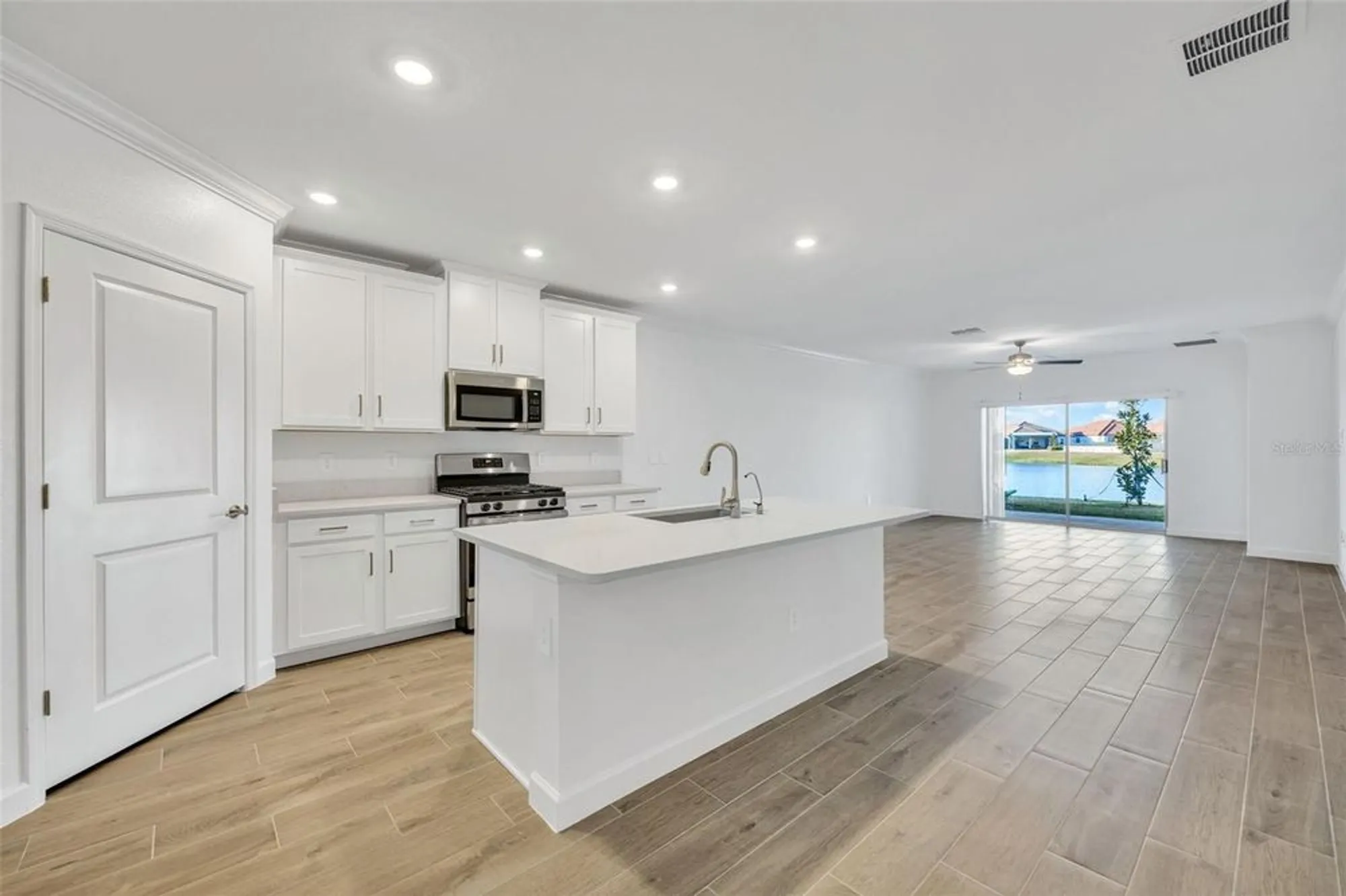 Property Slideshow image 4 of 63 | 17523 holly well ave, Wimauma, FL, 33598