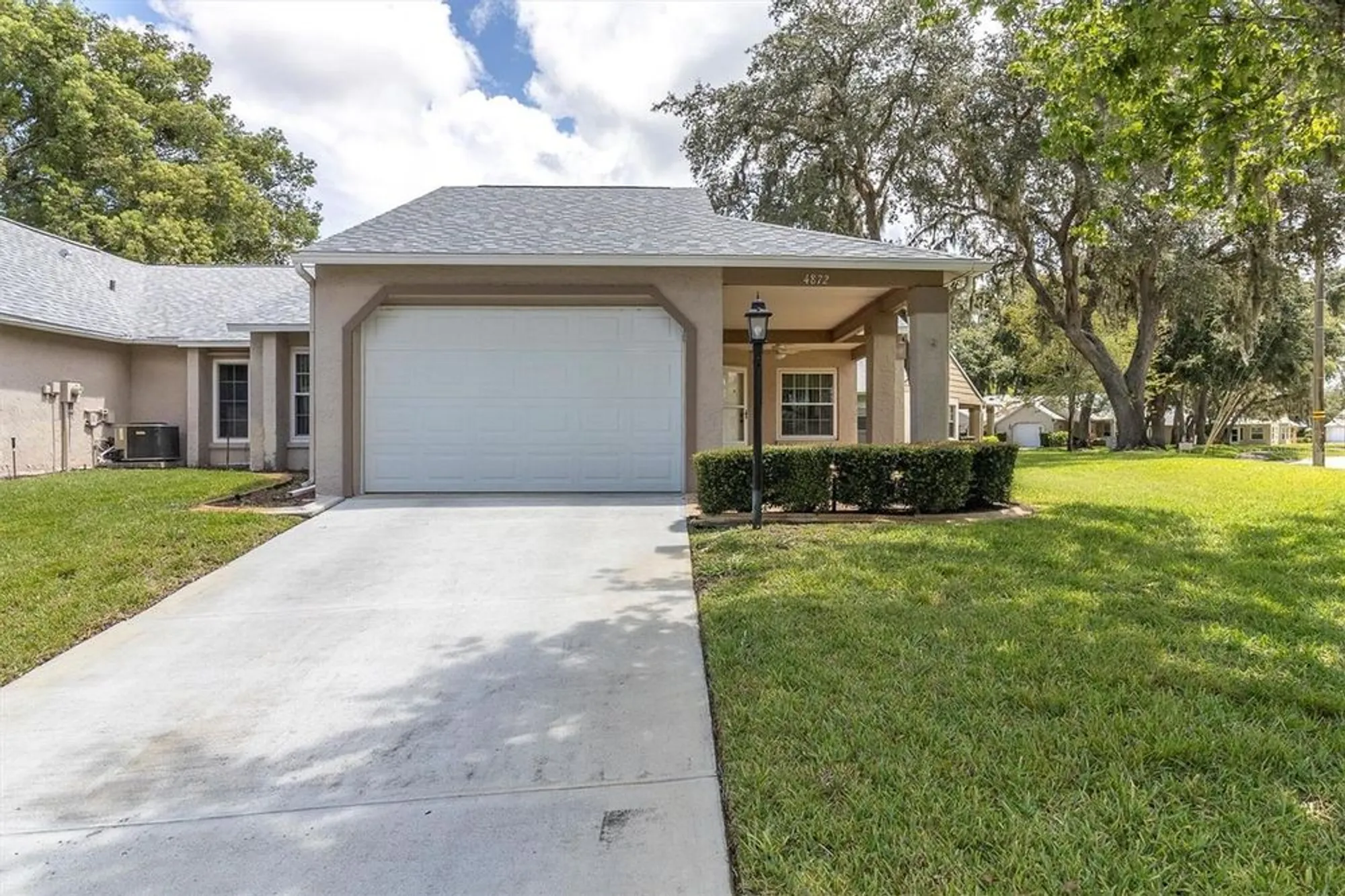 Property Slideshow image 1 of 54 | 4872 boonesboro ct, New Port Richey, FL, 34655