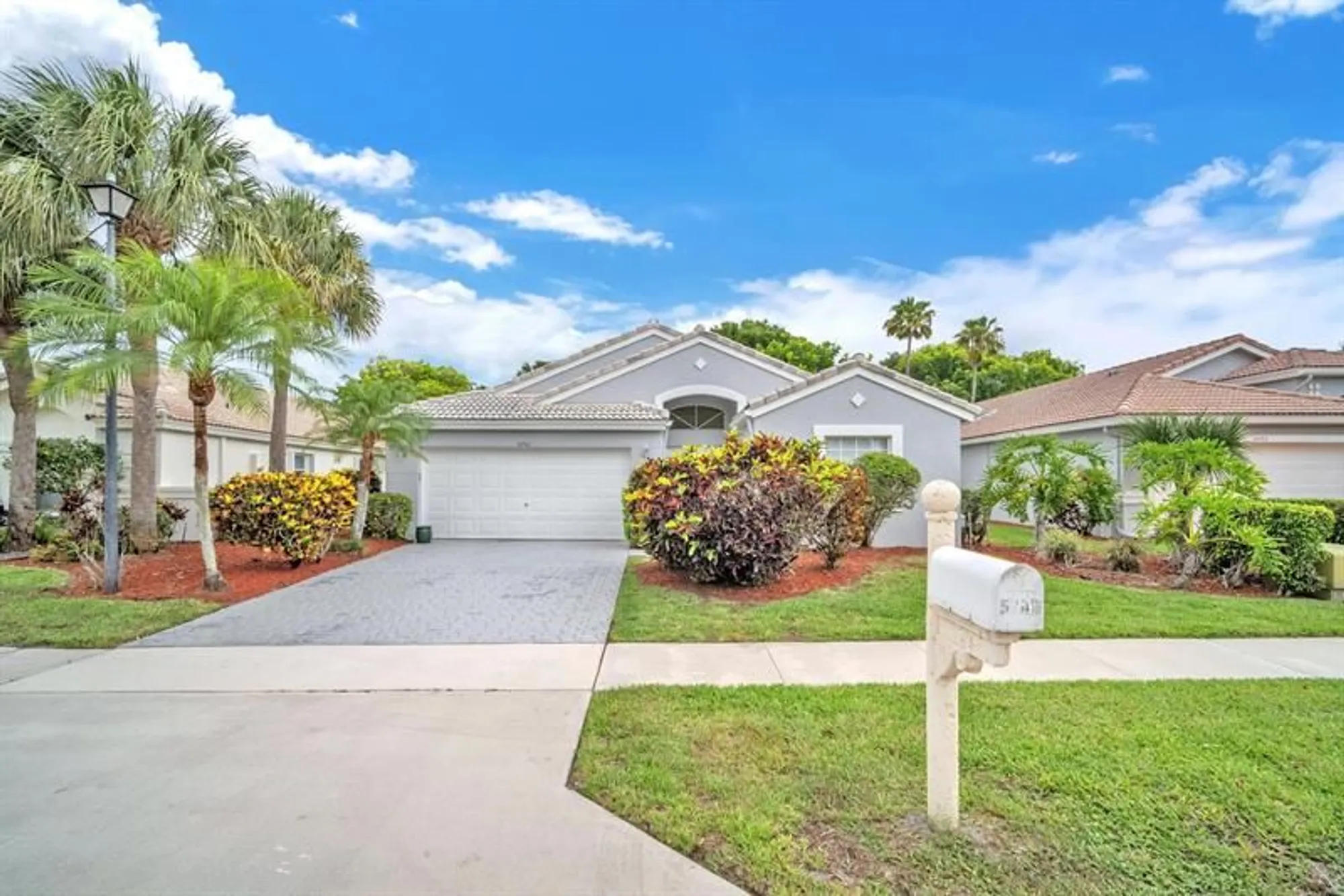 Property Slideshow image 2 of 57 | 5701 swaying palm ln, Boynton Beach, FL, 33437