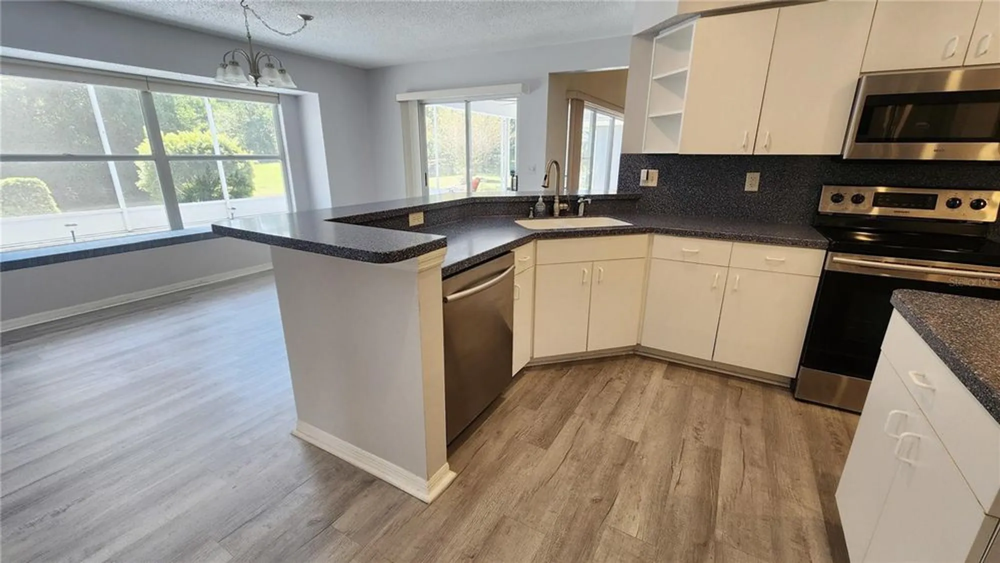 Property Slideshow image 6 of 60 | 2113 e del webb blvd, Sun City Center, FL, 33573