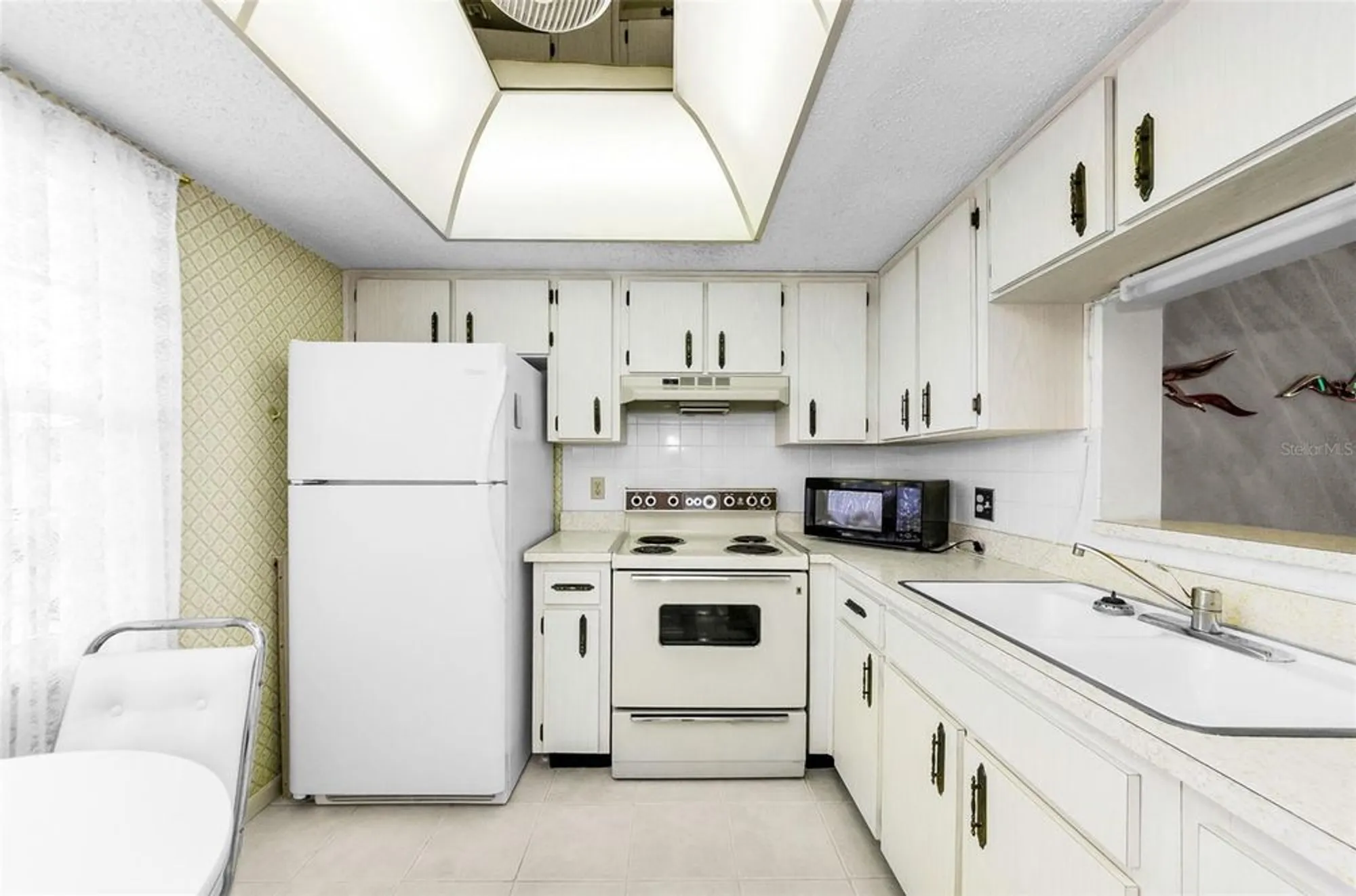 Property Slideshow image 18 of 41 | 1450 heather ridge blvd 307, Dunedin, FL, 34698