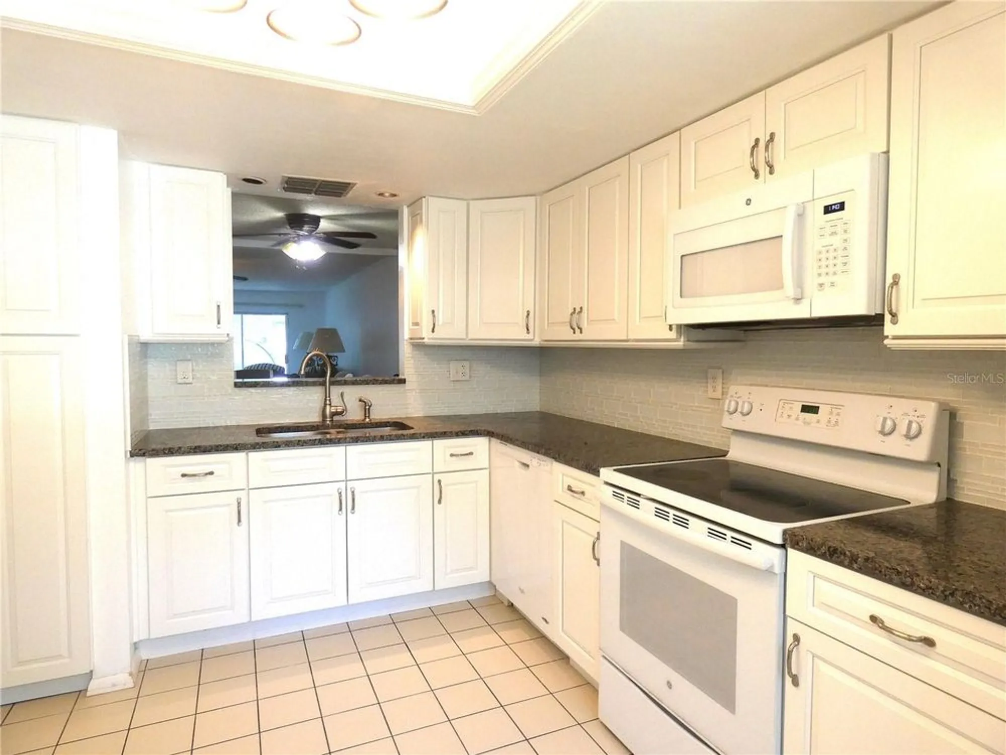 Property Slideshow image 11 of 33 | 11231 dollar lake dr apt 6, Port Richey, FL, 34668