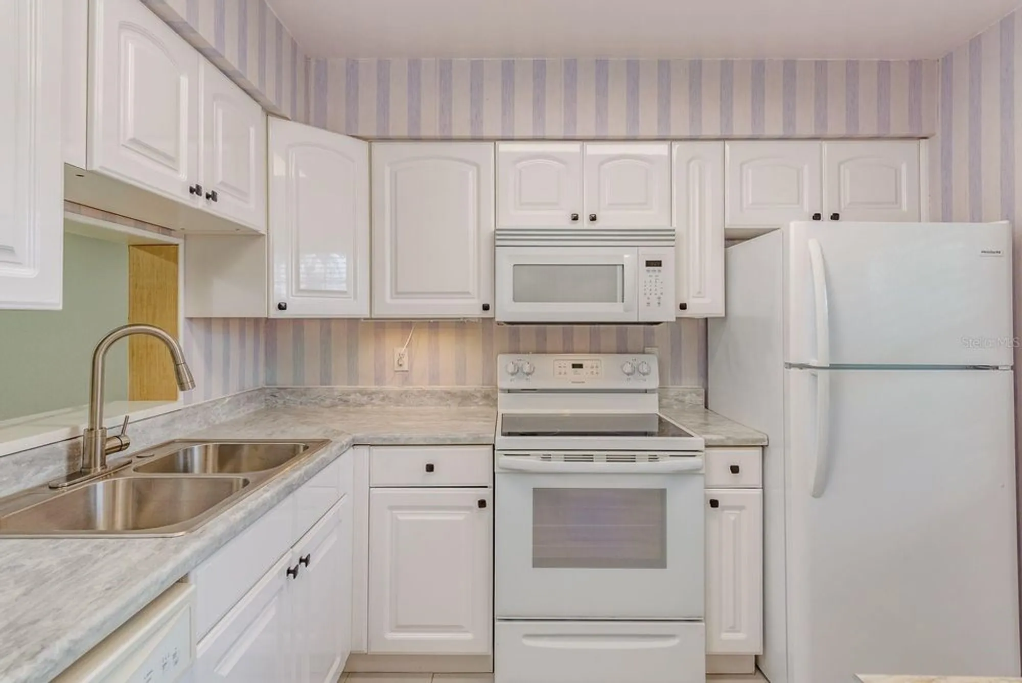 Property Slideshow image 8 of 29 | 1701 pinehurst rd 19e, Dunedin, FL, 34698