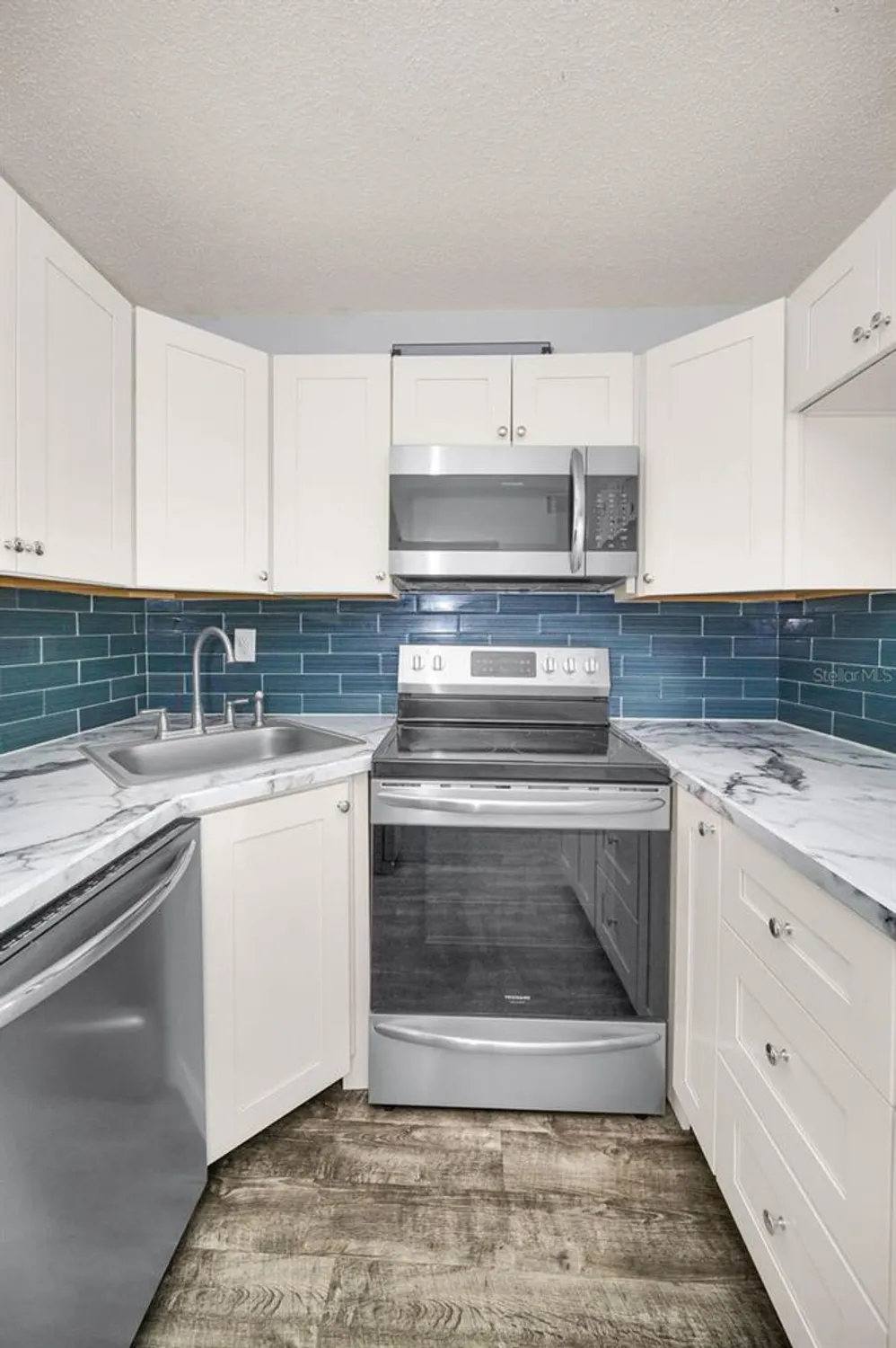 Property Slideshow image 13 of 70 | 2687 pine ridge way e1, Palm Harbor, FL, 34684