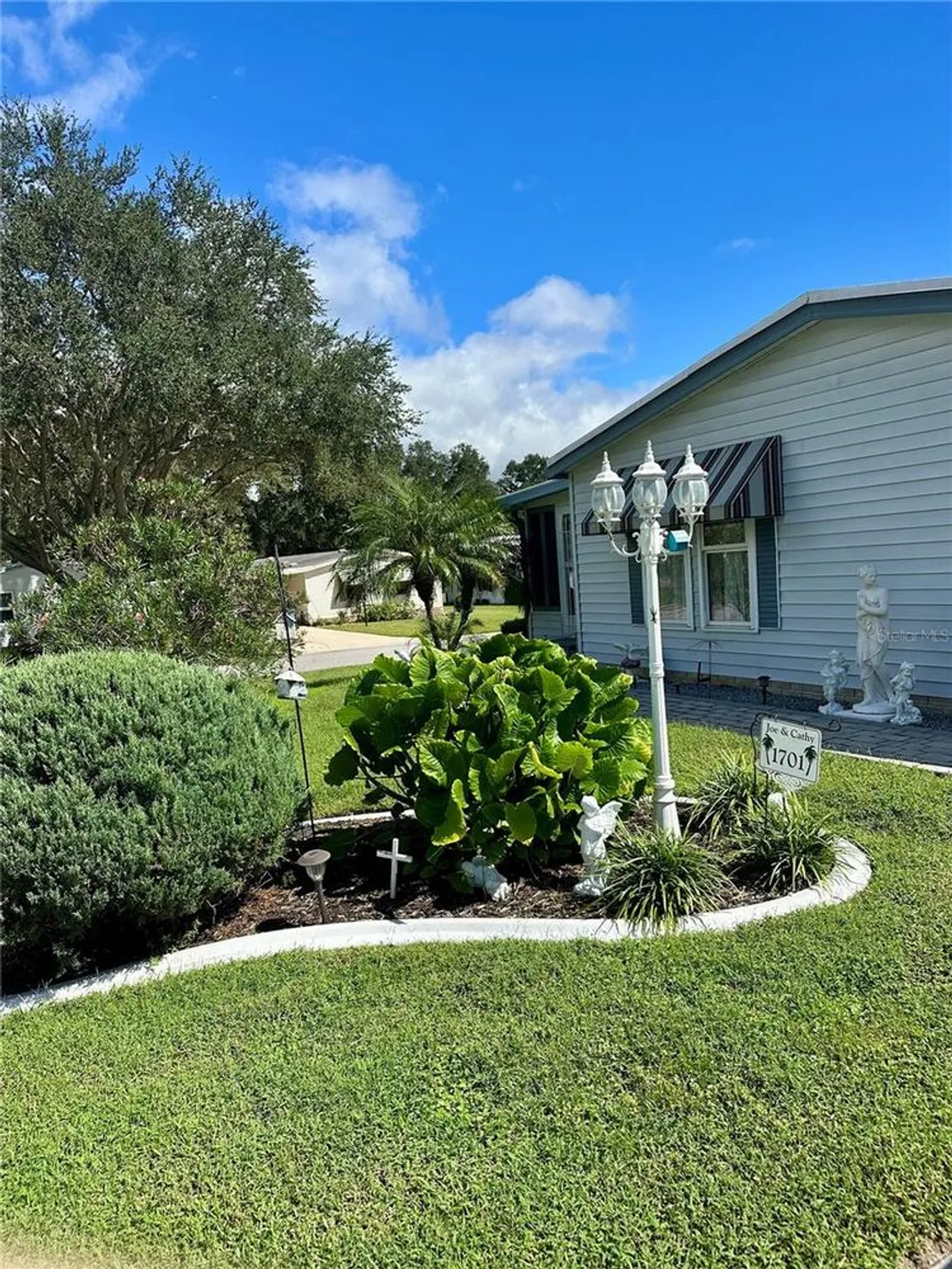 Property Slideshow image 6 of 37 | 1701 palm aire dr, The Villages, FL, 32159