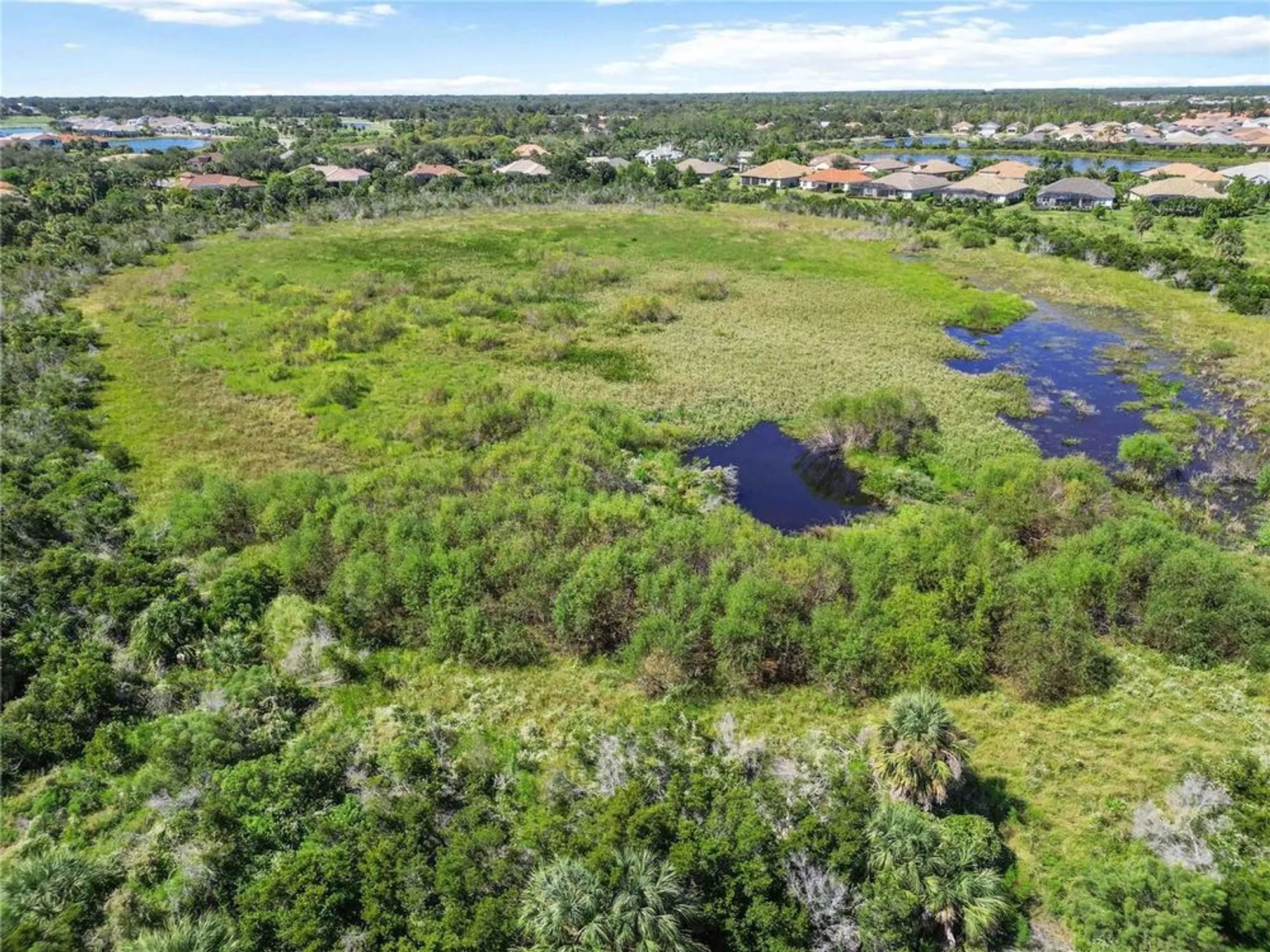 Property Slideshow image 41 of 62 | 26890 weiskopf dr, Englewood, FL, 34223