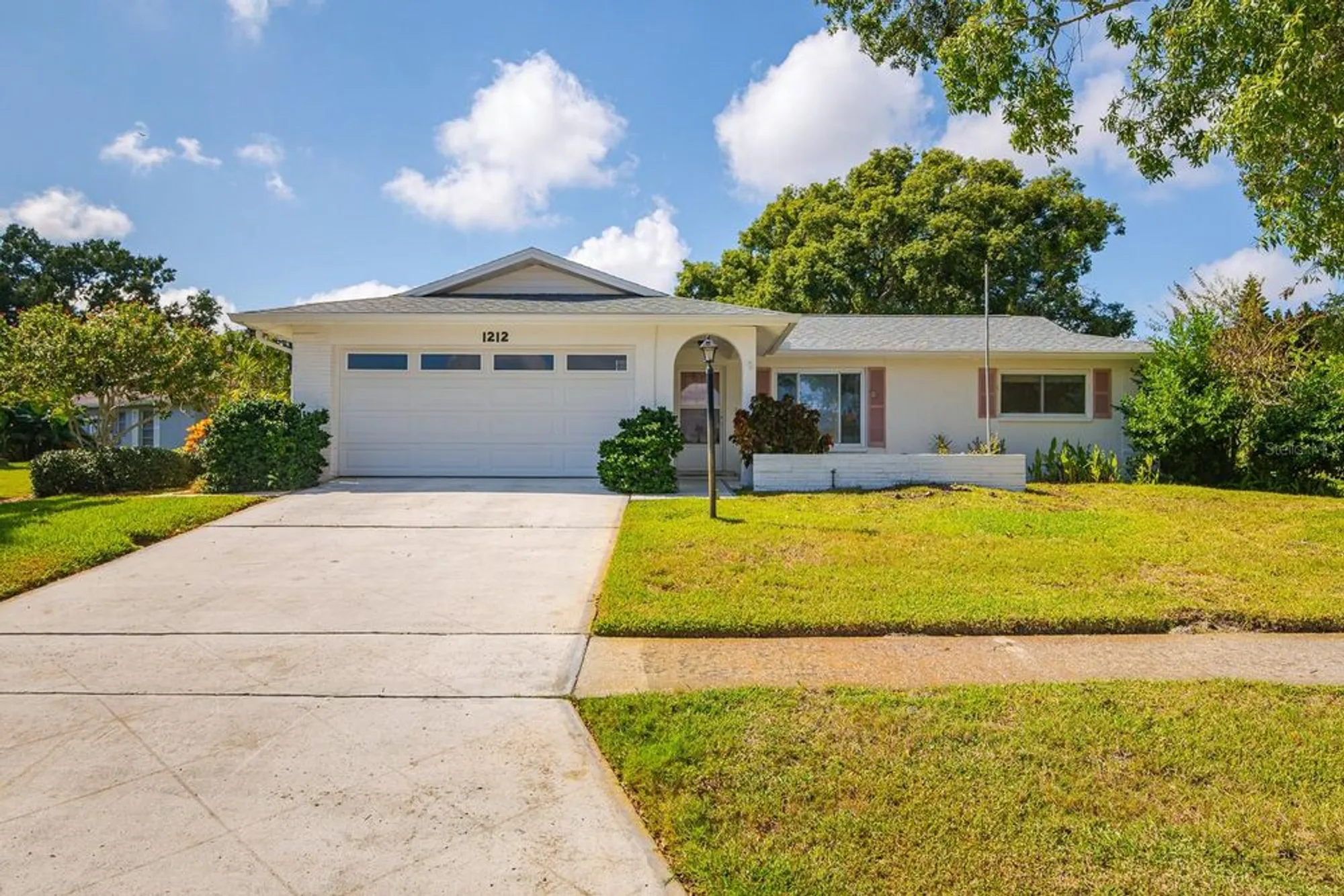 Property Slideshow image 1 of 45 | 1212 timberbrooke dr, Palm Harbor, FL, 34684