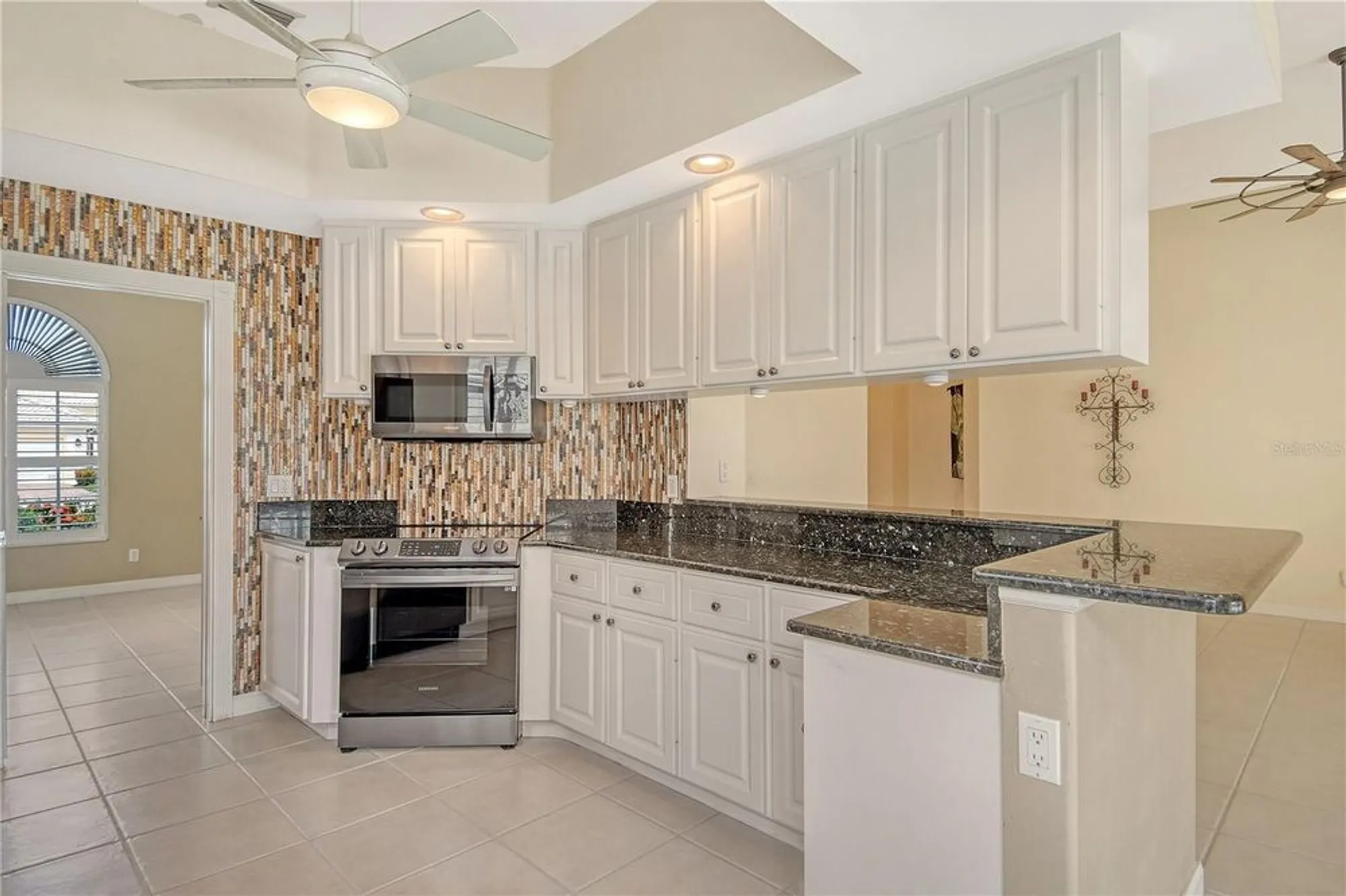 Property Slideshow image 12 of 70 | 5562 octonia pl, Sarasota, FL, 34238