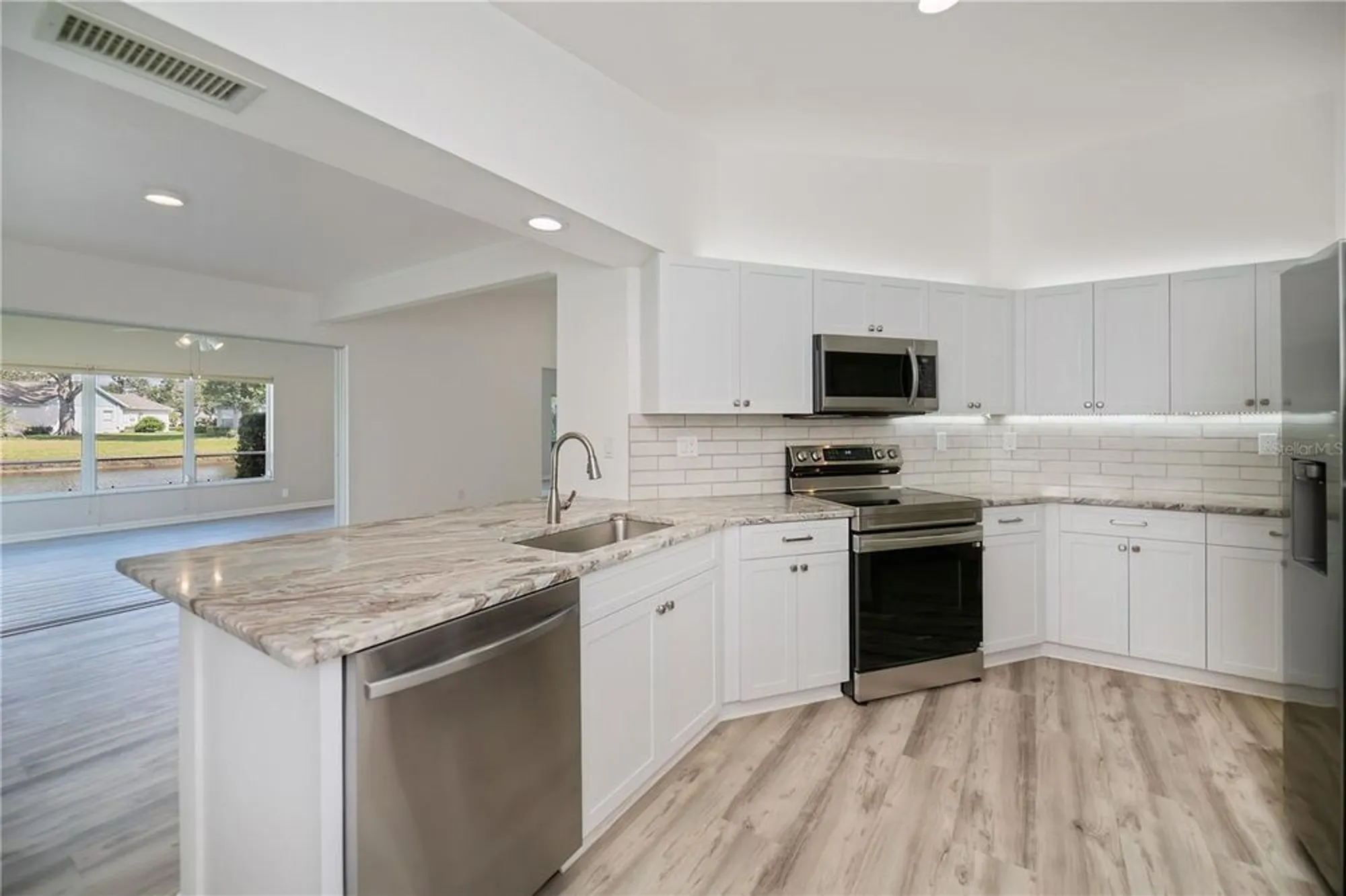 Property Slideshow image 11 of 58 | 425 cypress forest dr, Englewood, FL, 34223