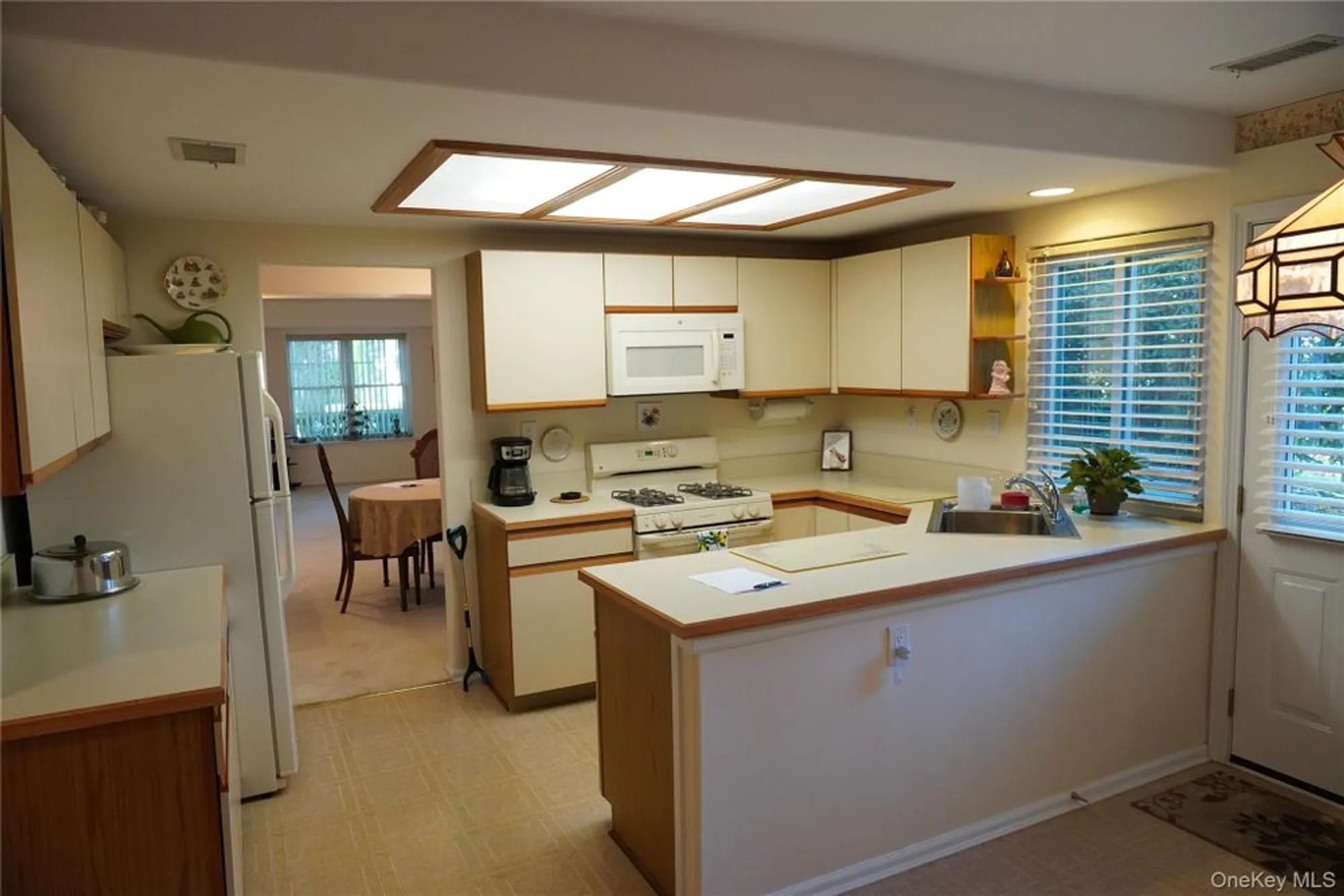 Property Slideshow image 8 of 15 | 12 baldwin ct, Ridge, NY, 11961