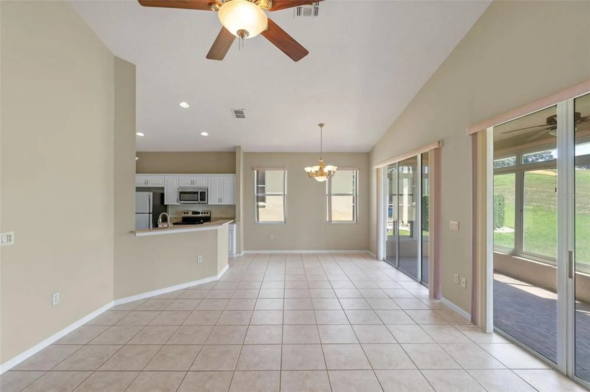 Property Slideshow image 7 of 63 | 890 summit greens blvd, Clermont, FL, 34711