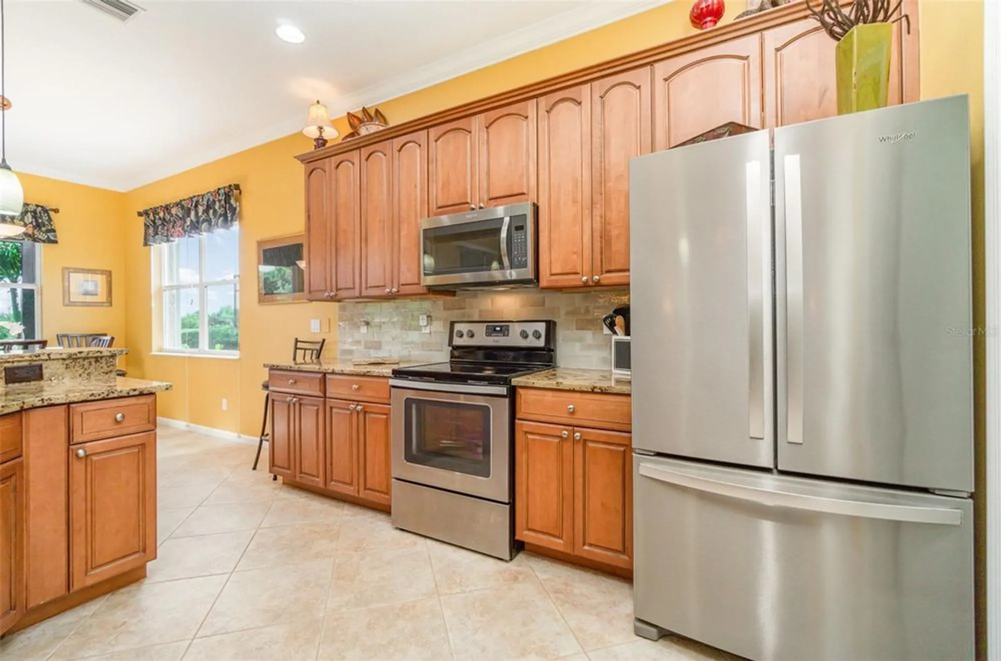 Property Slideshow image 10 of 62 | 13376 golf pointe dr, Port Charlotte, FL, 33953