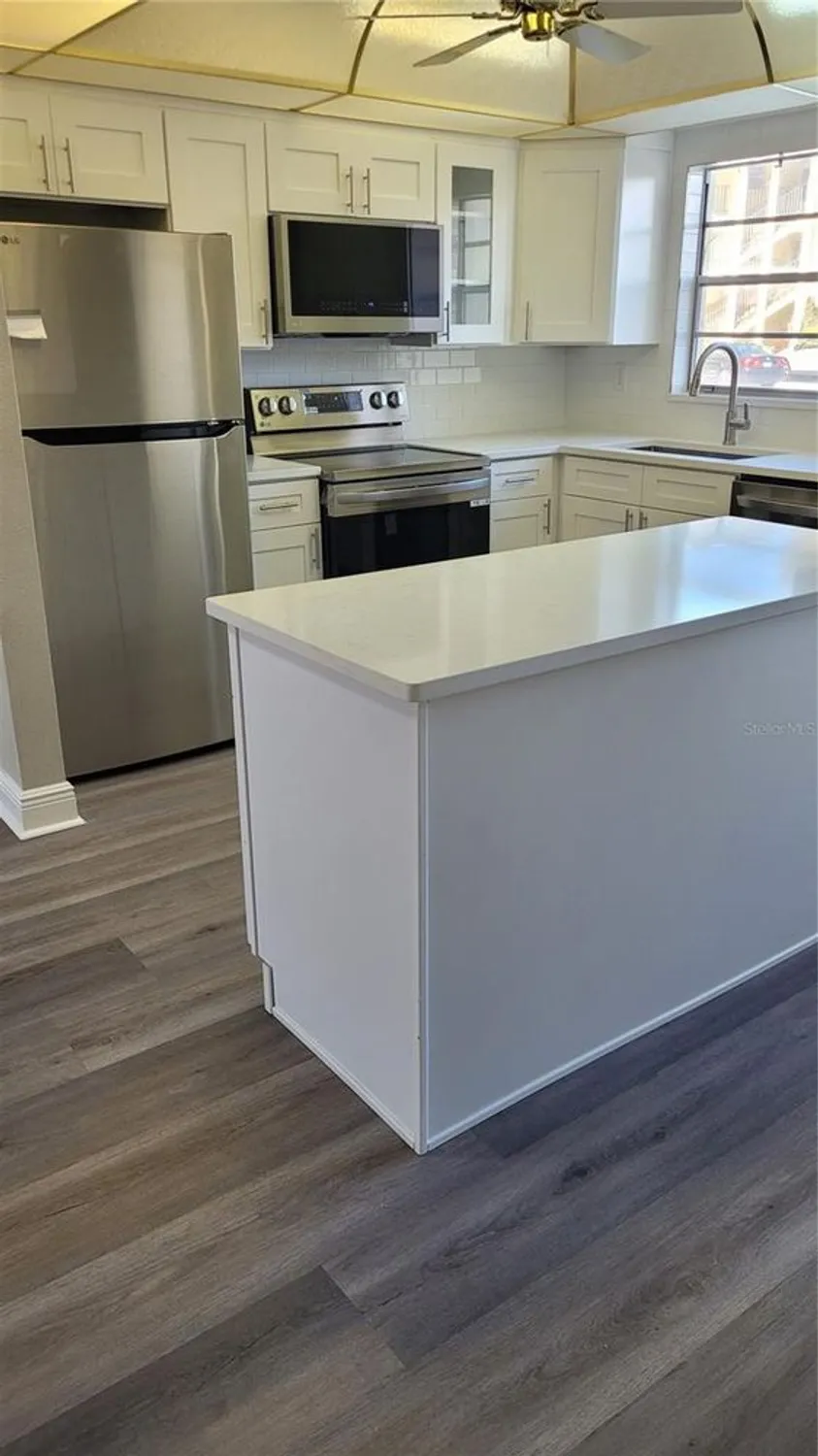 Property Slideshow image 4 of 32 | 4650 cove cir apt 111, St Petersburg, FL, 33708