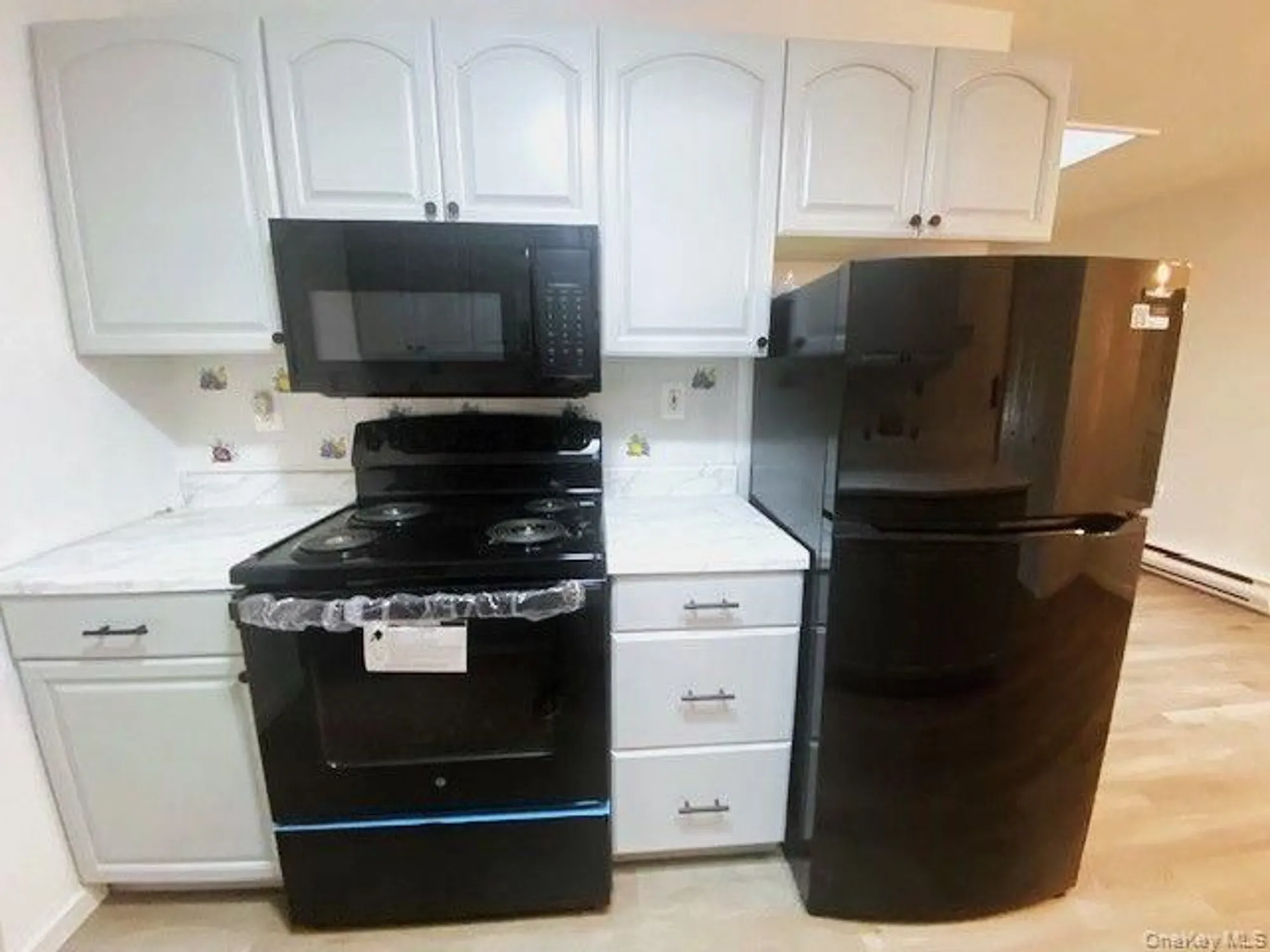 Property Slideshow image 11 of 21 | 259 newcastle ct e, Ridge, NY, 11961