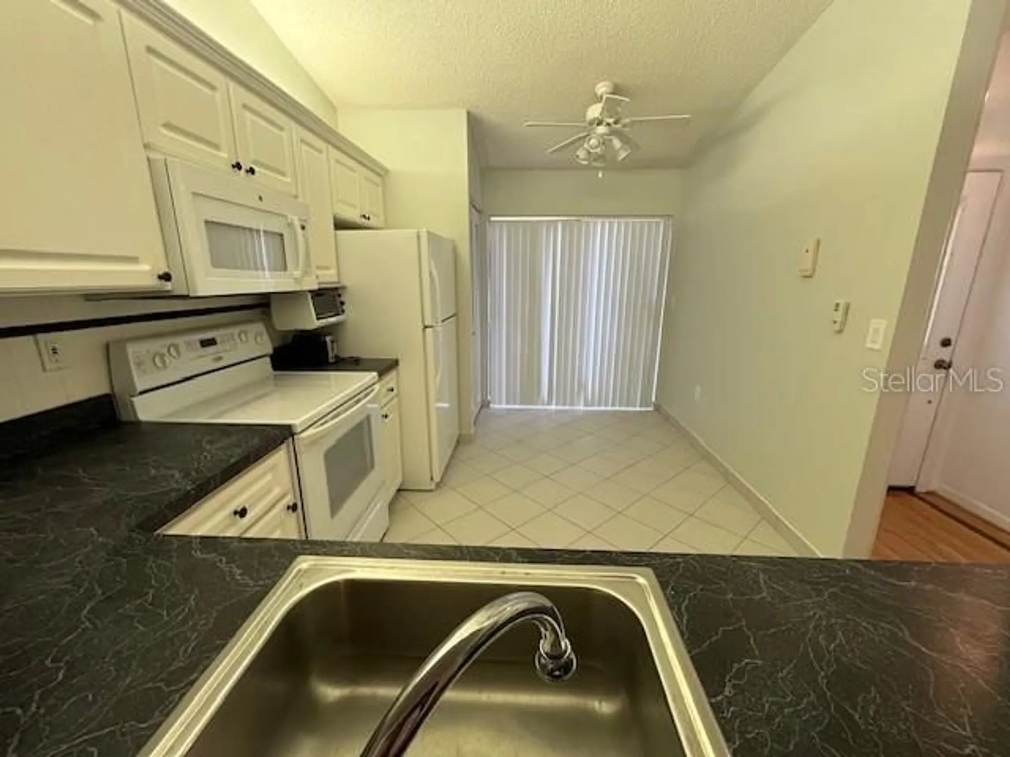 Property Slideshow image 6 of 28 | 1725 pine ridge way e apt e c, Palm Harbor, FL, 34684