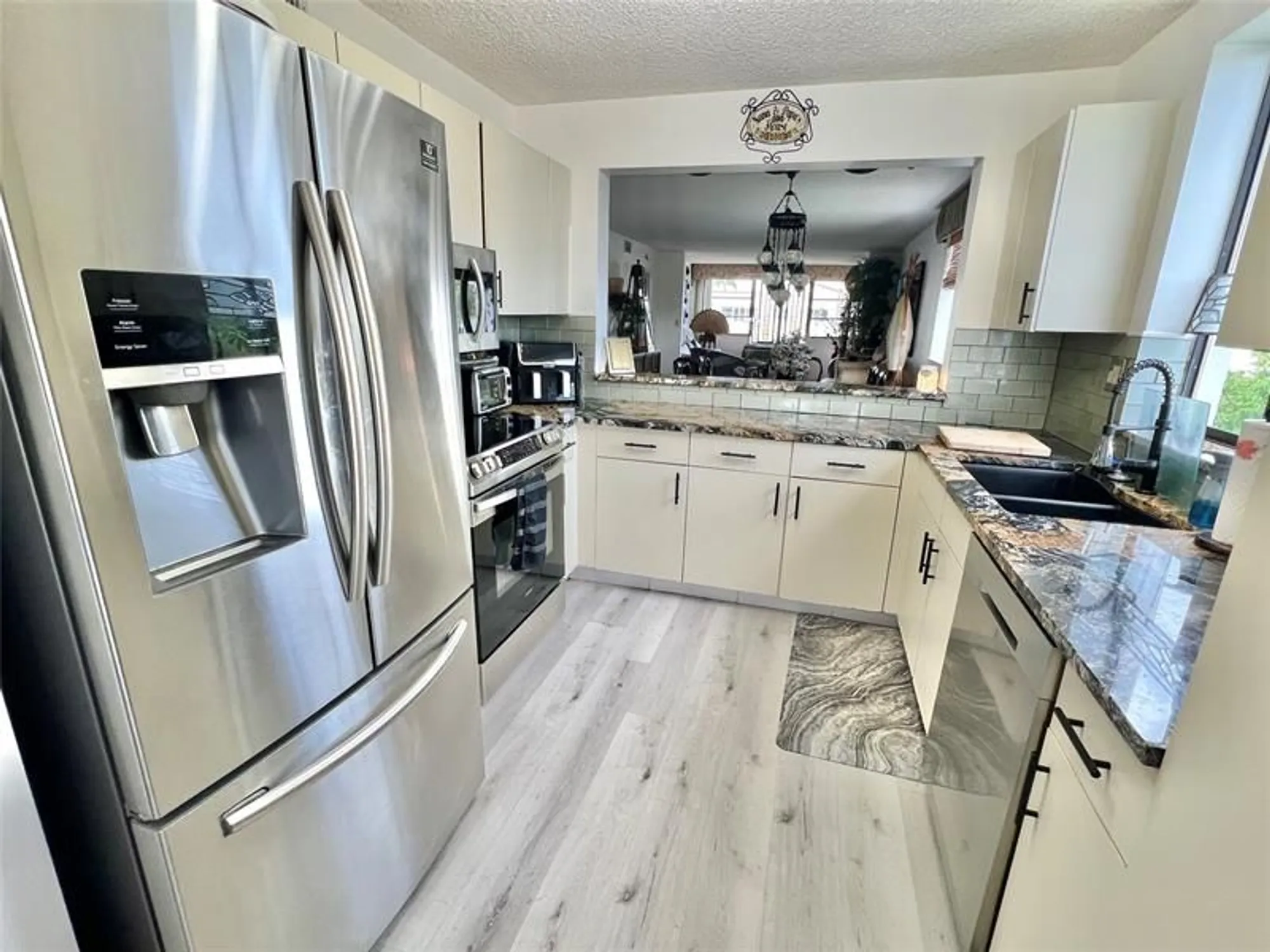 Property Slideshow image 4 of 21 | 10842 w clairmont cir # 310, Tamarac, FL, 33321