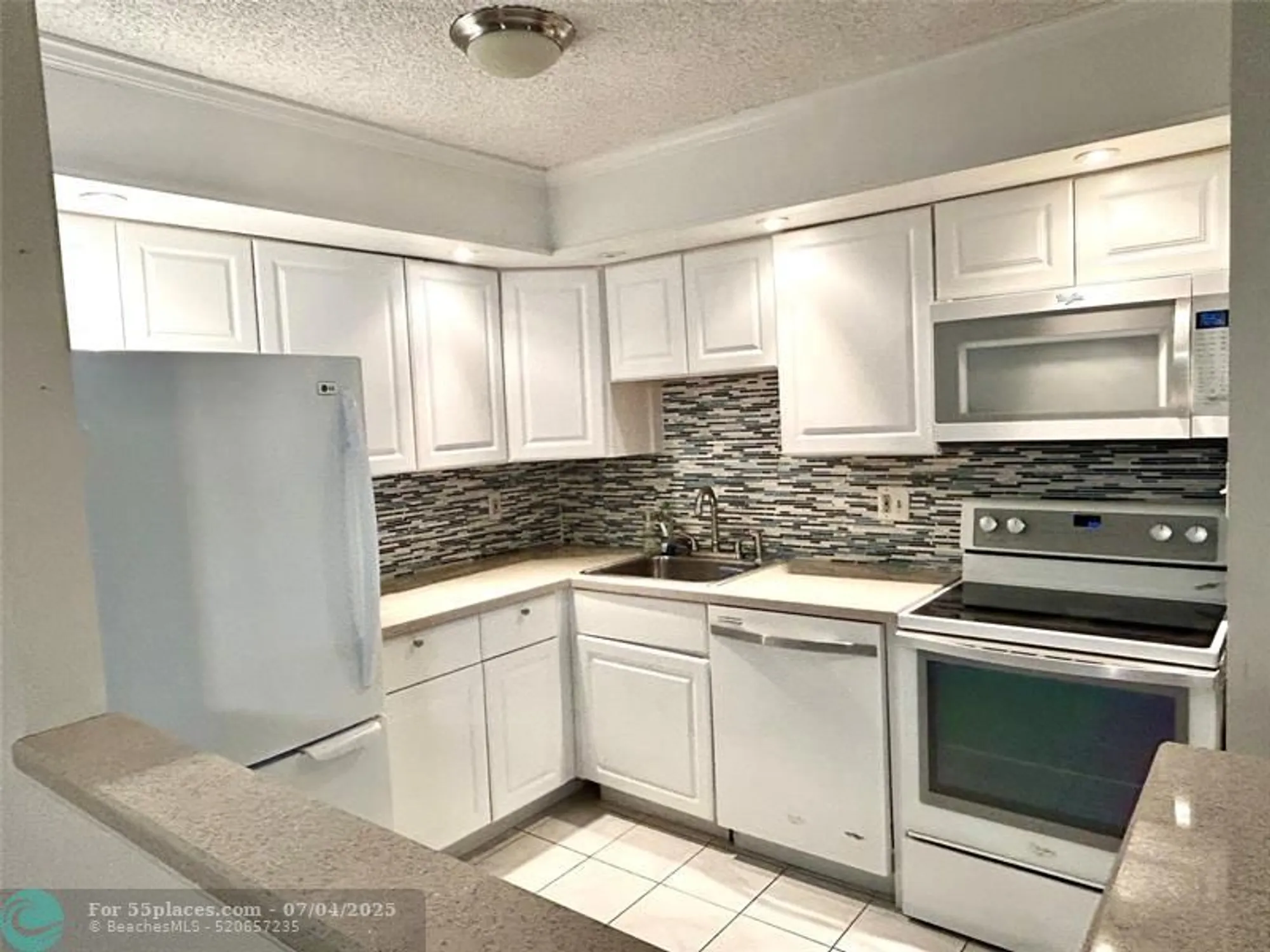 Property Slideshow image 4 of 14 | 10429 e clairmont cir # 108, Tamarac, FL, 33321