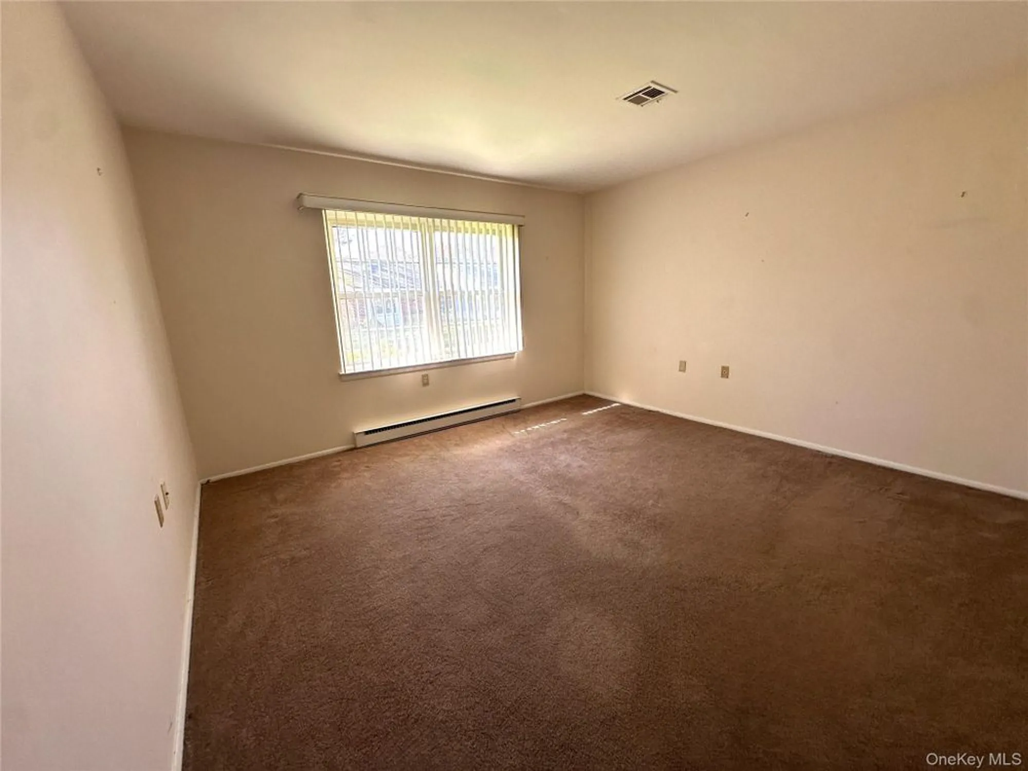 Property Slideshow image 11 of 15 | 215 woodbridge dr a, Ridge, NY, 11961