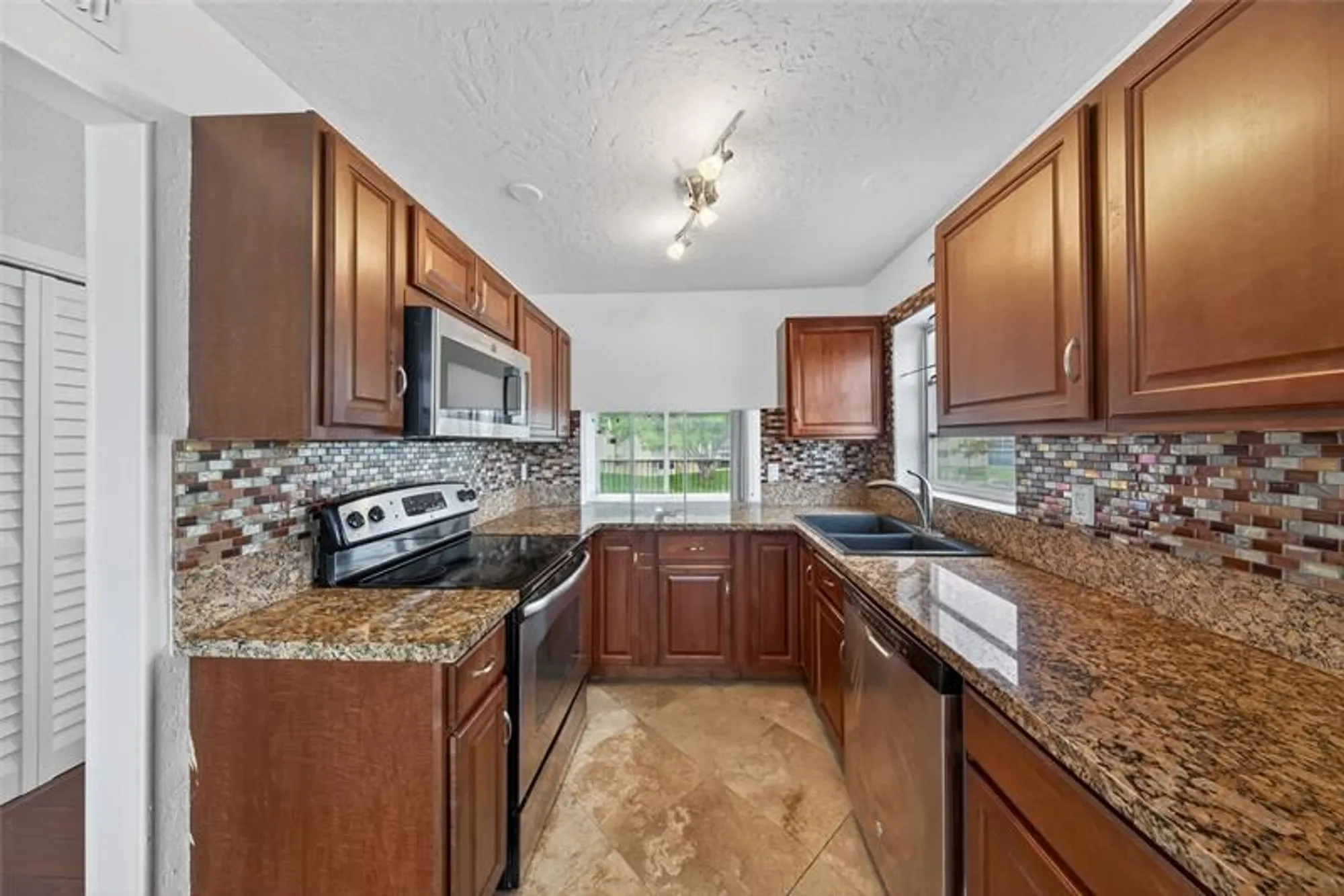 Property Slideshow image 1 of 33 | 6070 nw 64th ave 212, Tamarac, FL, 33319