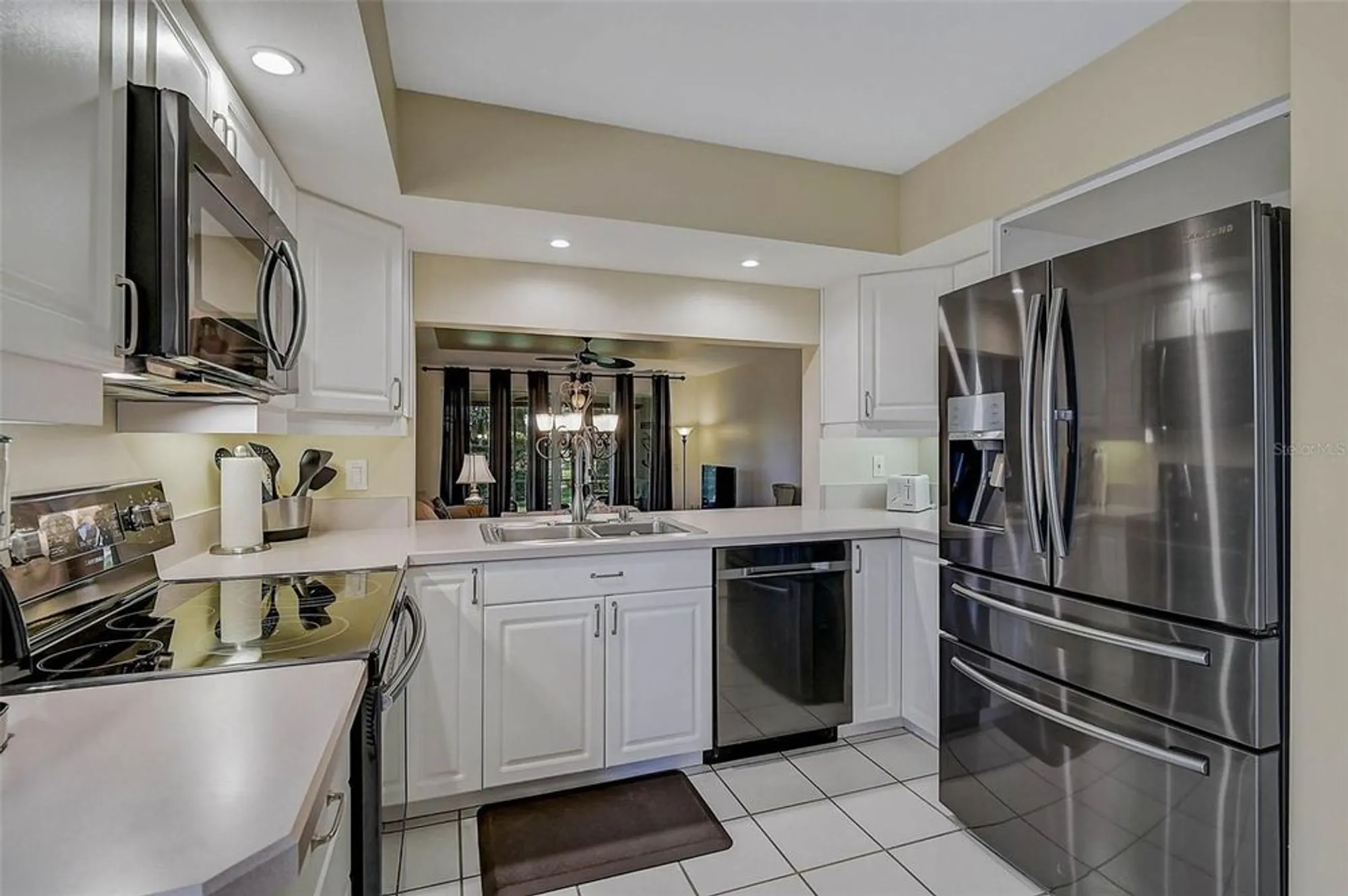 Property Slideshow image 8 of 49 | 7341 golf pointe cir, Sarasota, FL, 34243
