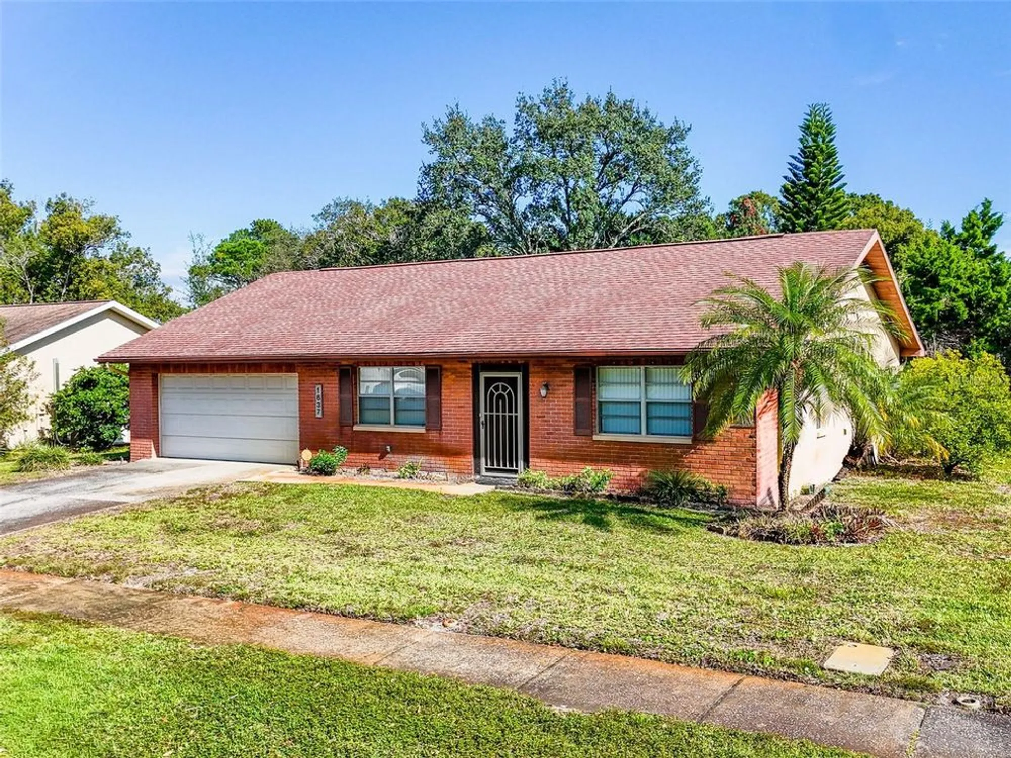 Property Slideshow image 1 of 51 | 1637 caledonia dr, Palm Harbor, FL, 34684