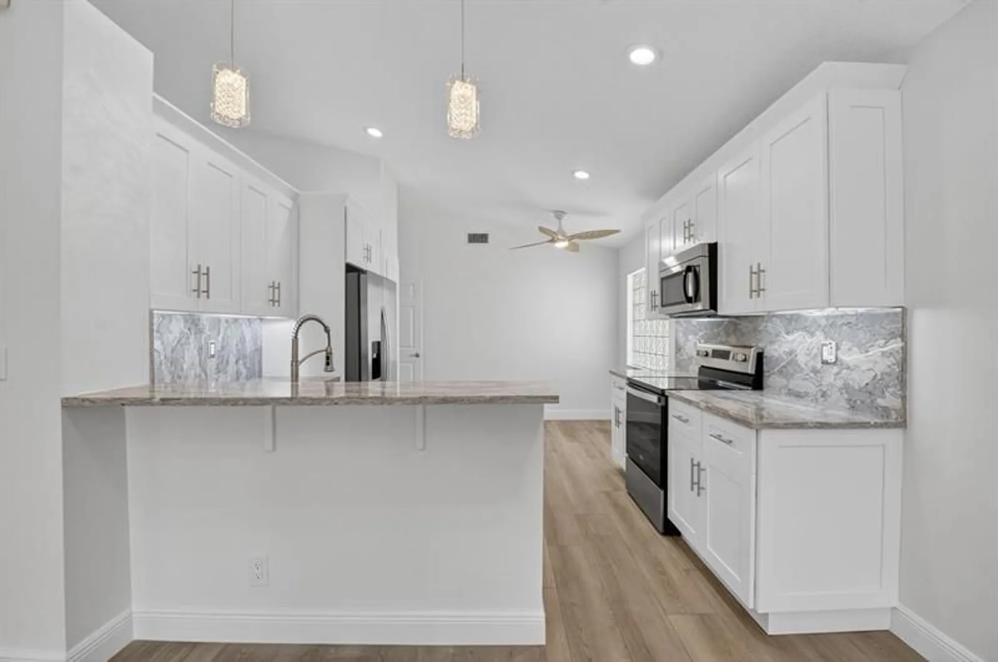 Property Slideshow image 12 of 62 | 5891 royal isles blvd, Boynton Beach, FL, 33437