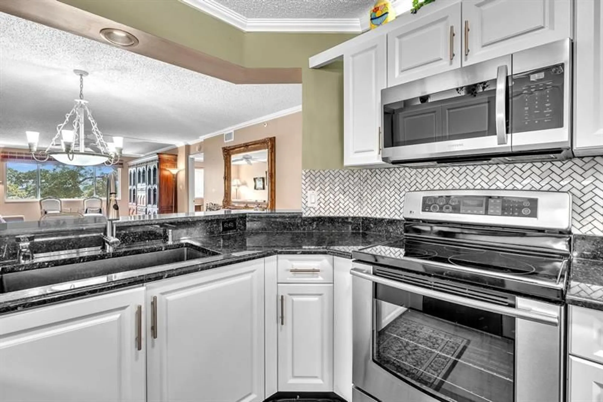 Property Slideshow image 12 of 75 | 9587 weldon cir b311, Tamarac, FL, 33321
