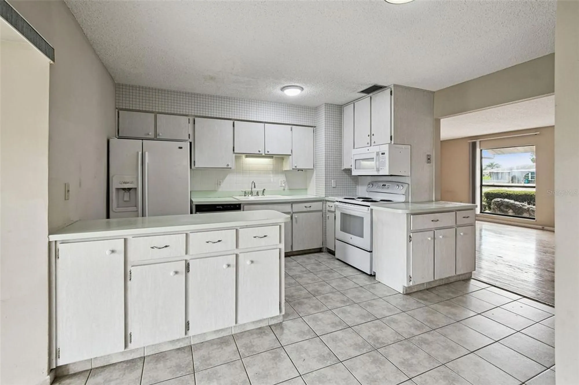 Property Slideshow image 26 of 100 | 1803 pineapple palm ct, Sun City Center, FL, 33573