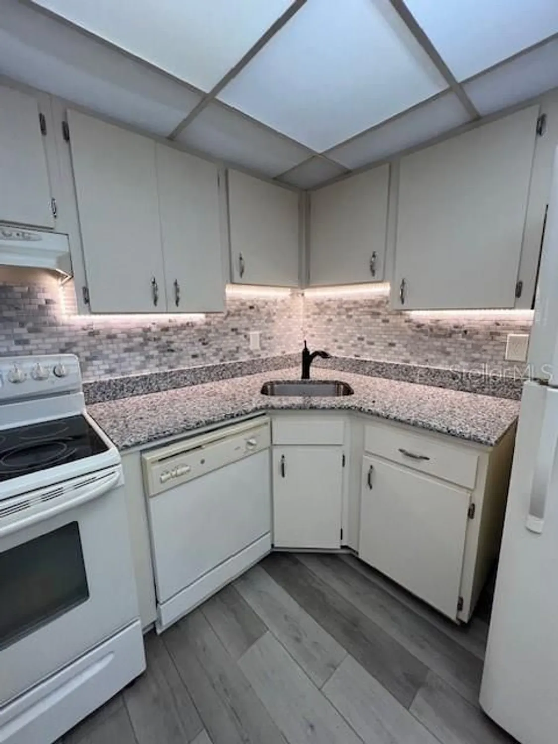 Property Slideshow image 4 of 27 | 21260 brinson ave 211, Port Charlotte, FL, 33952