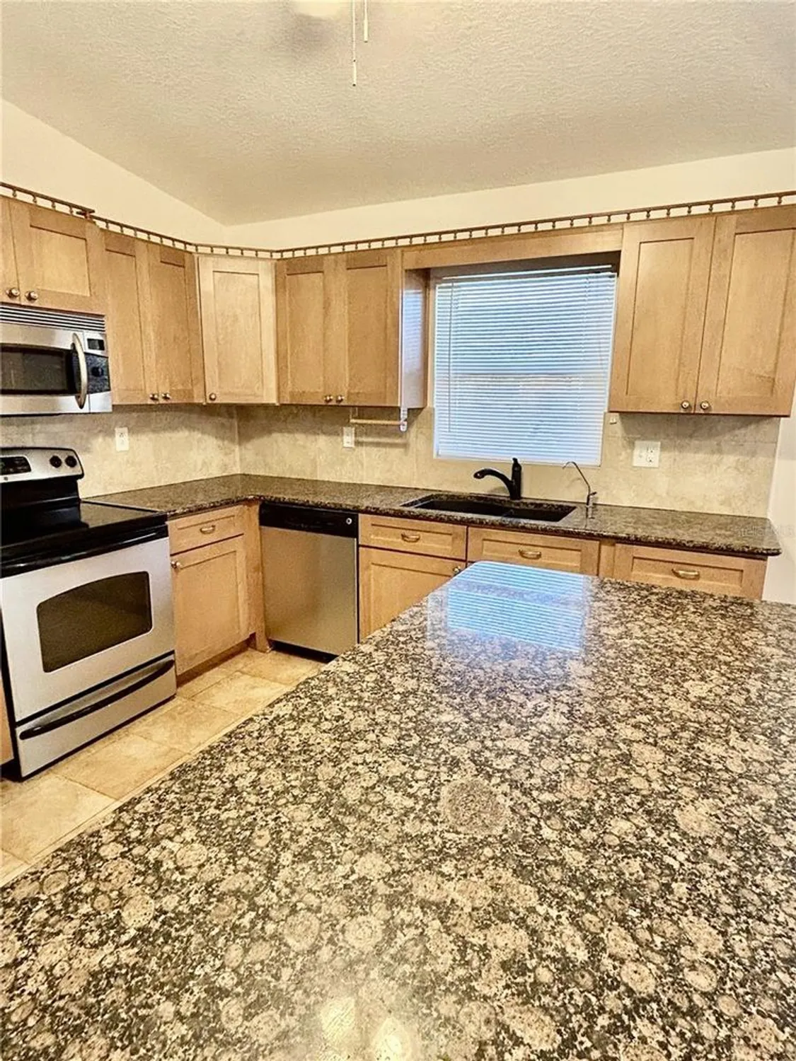 Property Slideshow image 7 of 19 | 1421 heather ridge blvd # 1421, Dunedin, FL, 34698