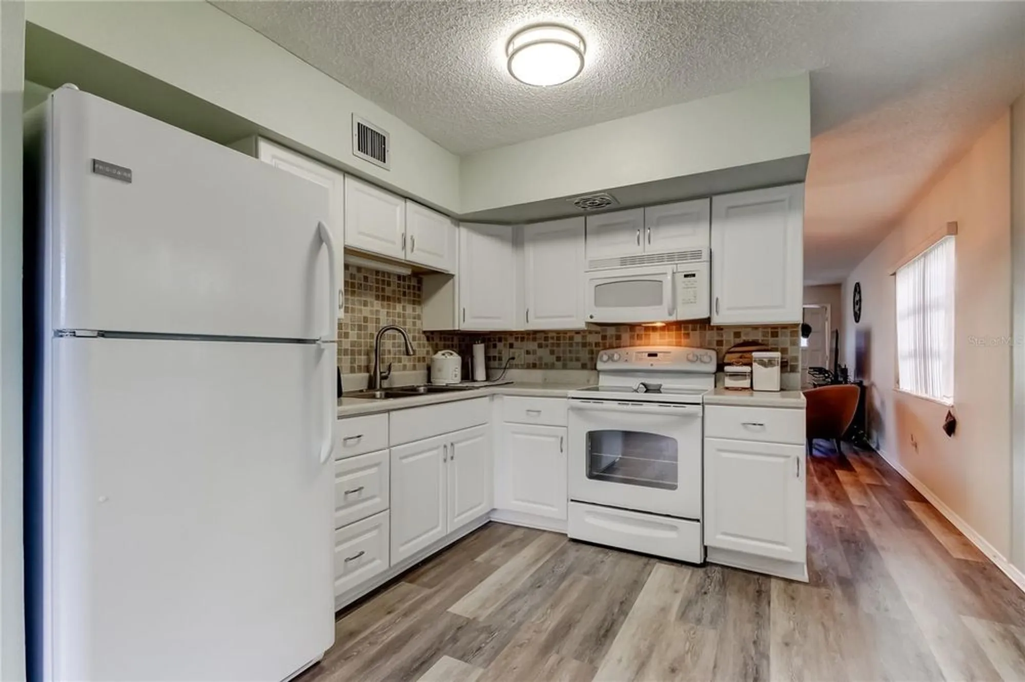 Property Slideshow image 14 of 46 | 2460 persian dr 26, Clearwater, FL, 33763