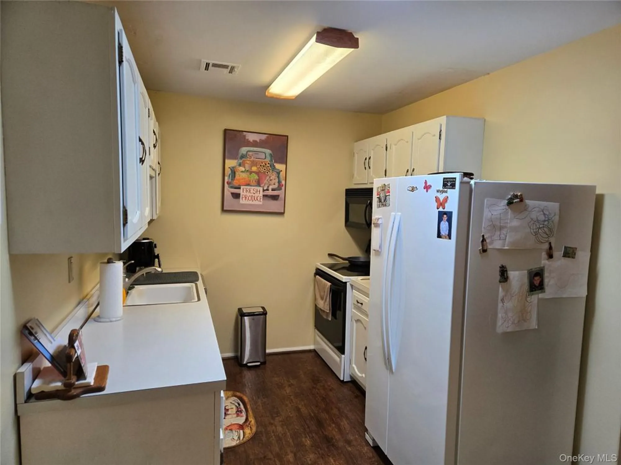 Property Slideshow image 7 of 15 | 311 woodbridge dr 311-c, Ridge, NY, 11961