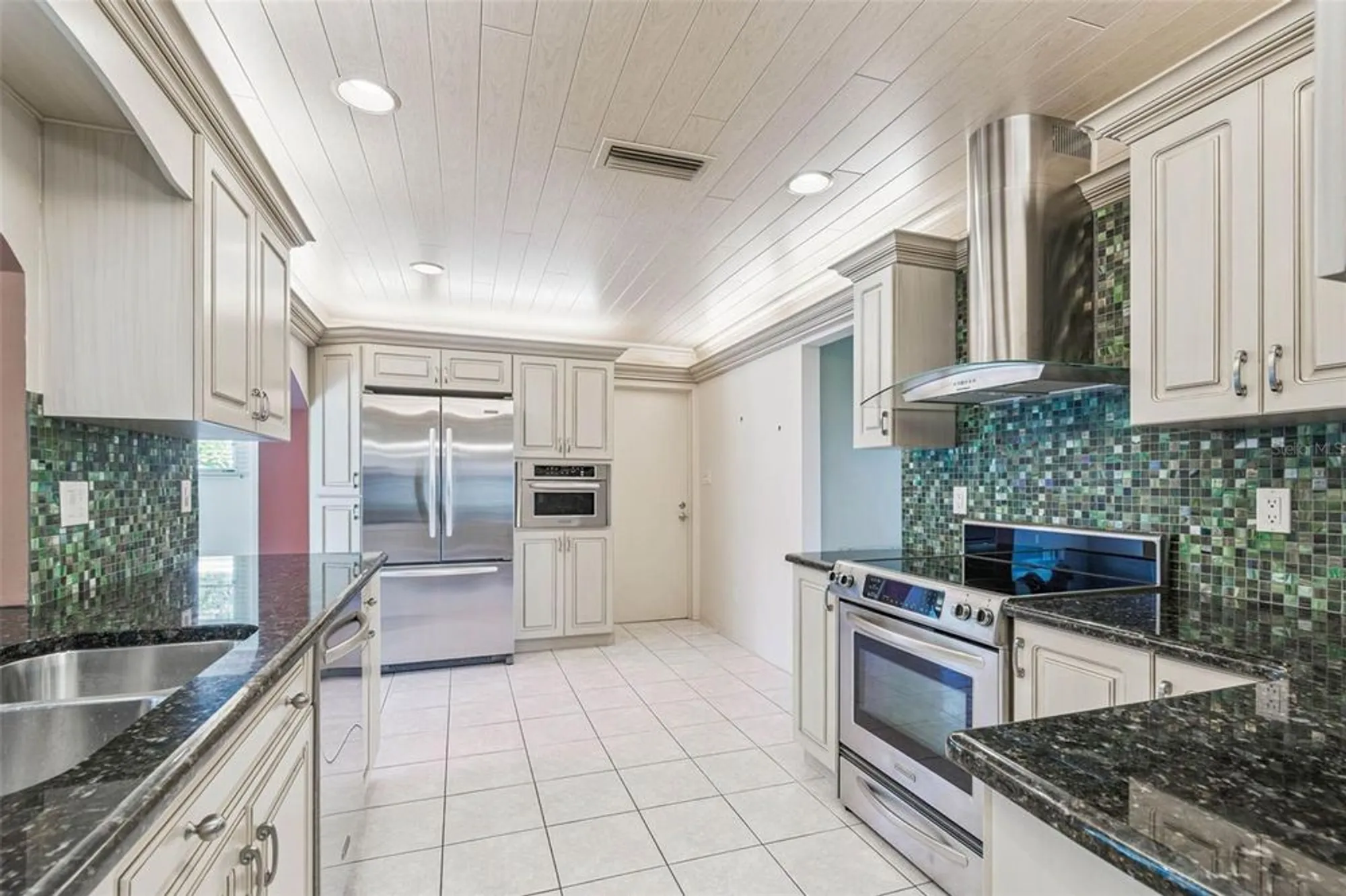 Property Slideshow image 7 of 31 | 9548 141st st, Seminole, FL, 33776