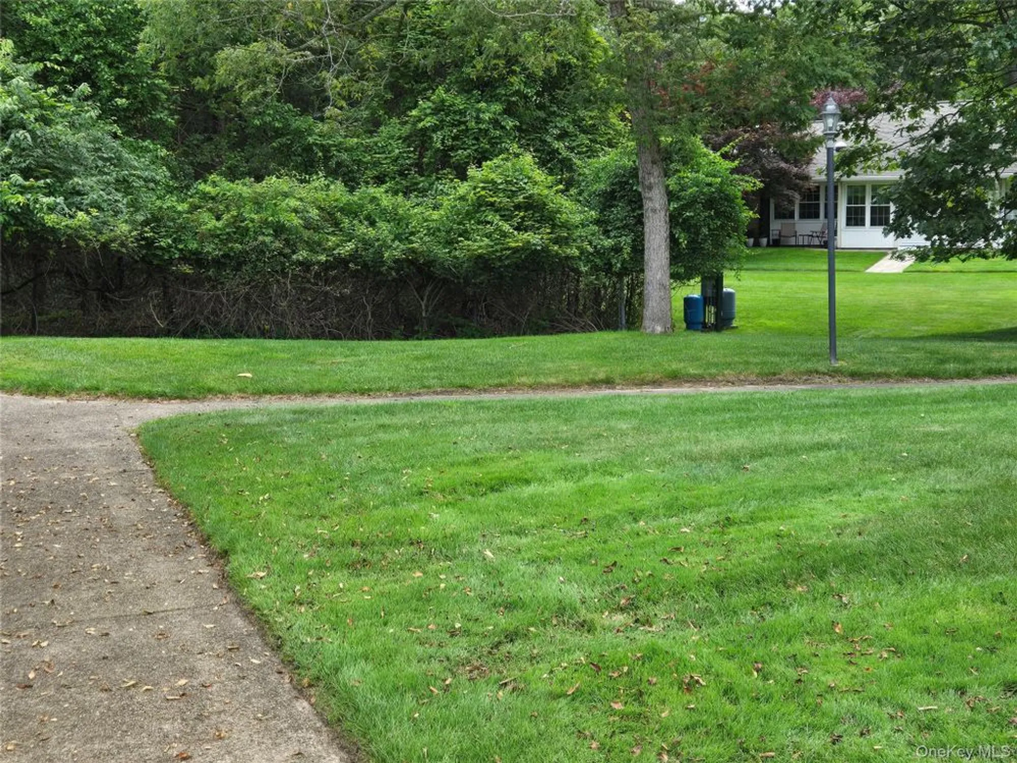 Property Slideshow image 15 of 15 | 311 woodbridge dr 311-c, Ridge, NY, 11961